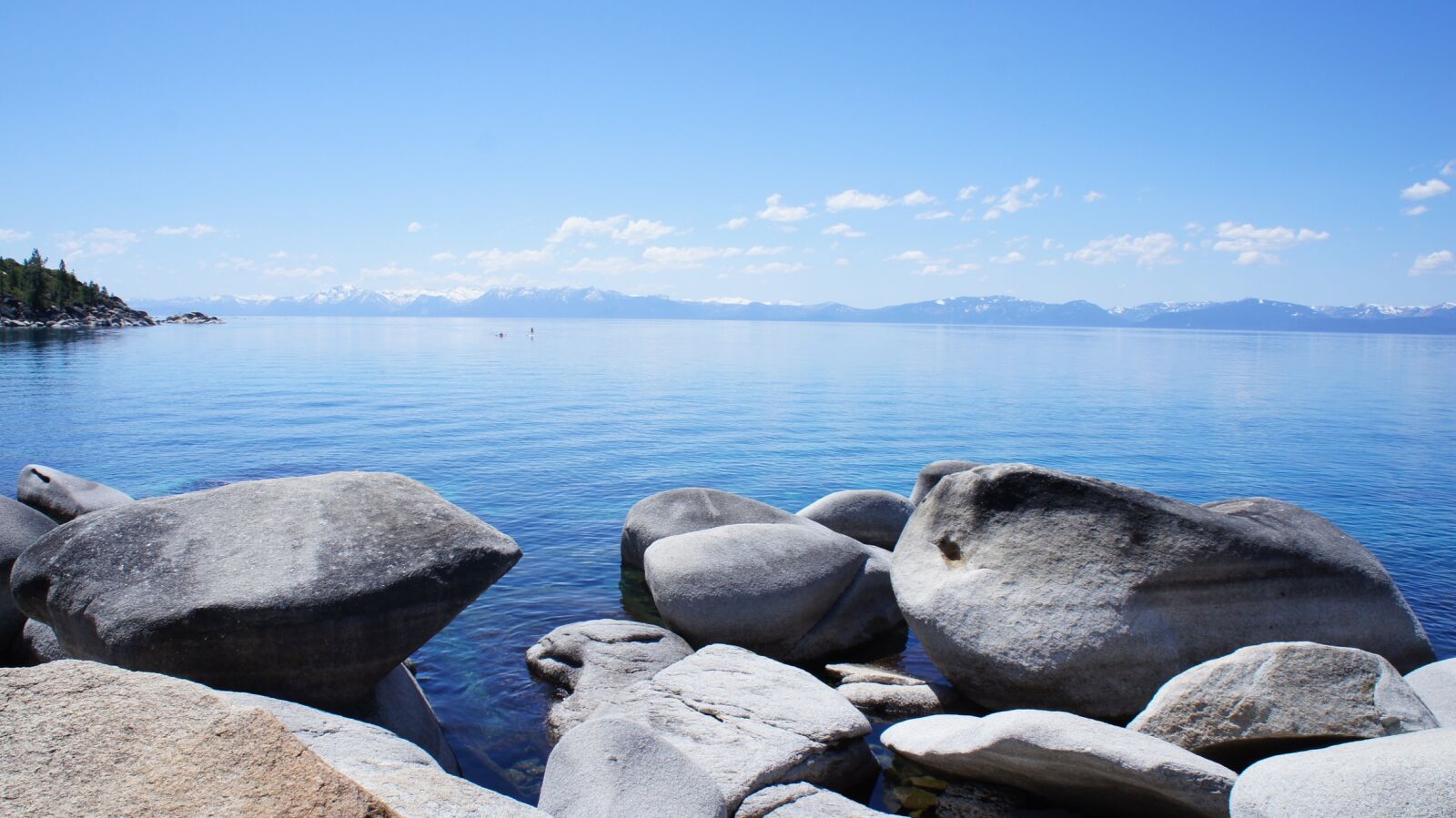 Sony E 18-55mm F3.5-5.6 OSS sample photo. Blue, clouds, lake, rock photography