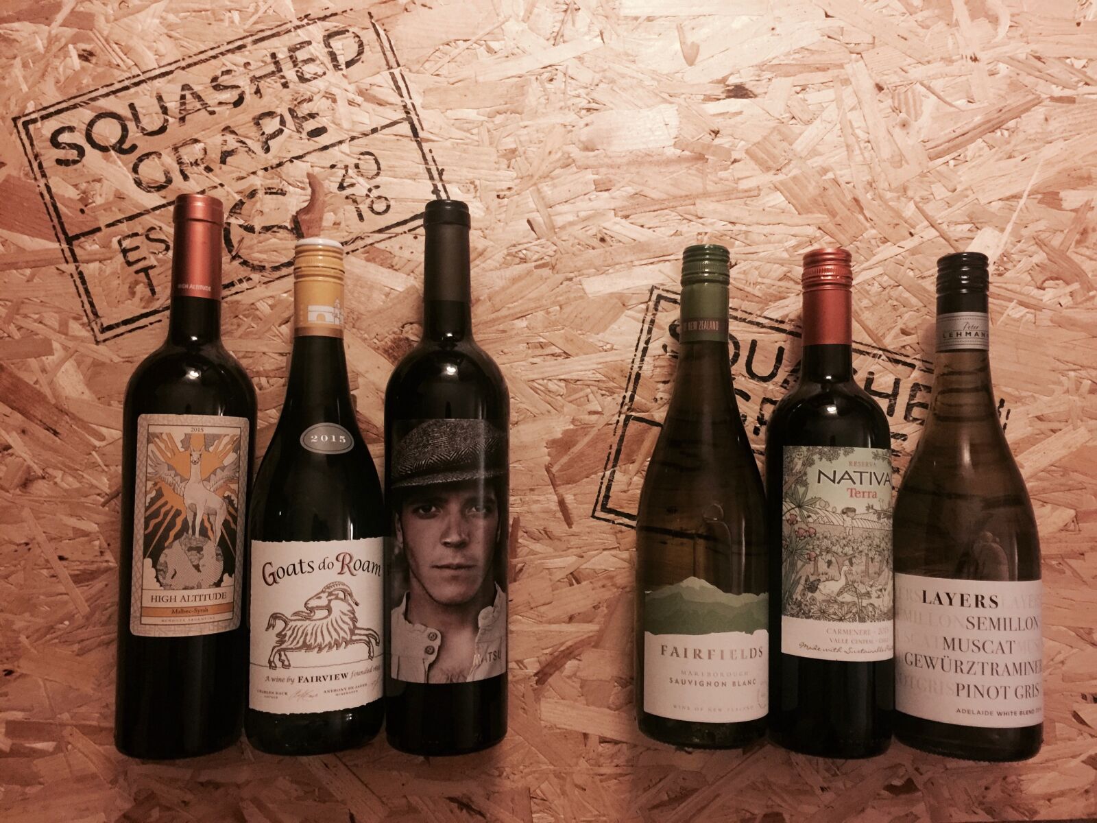 iPhone 6 Plus back camera 4.15mm f/2.2 sample photo. Wine, bottles, on, cork photography