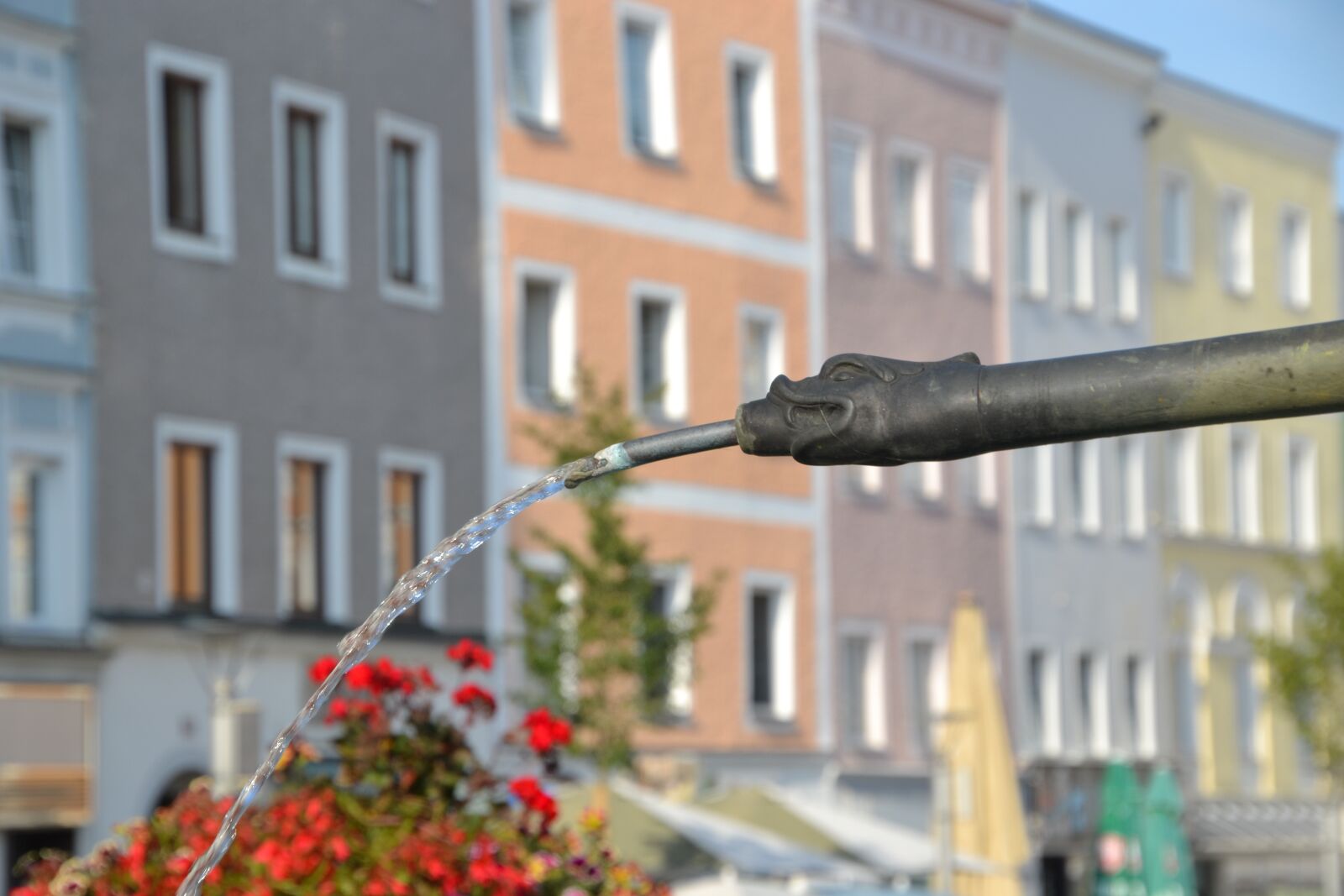 Nikon D3100 sample photo. Buildings, street, fountain photography