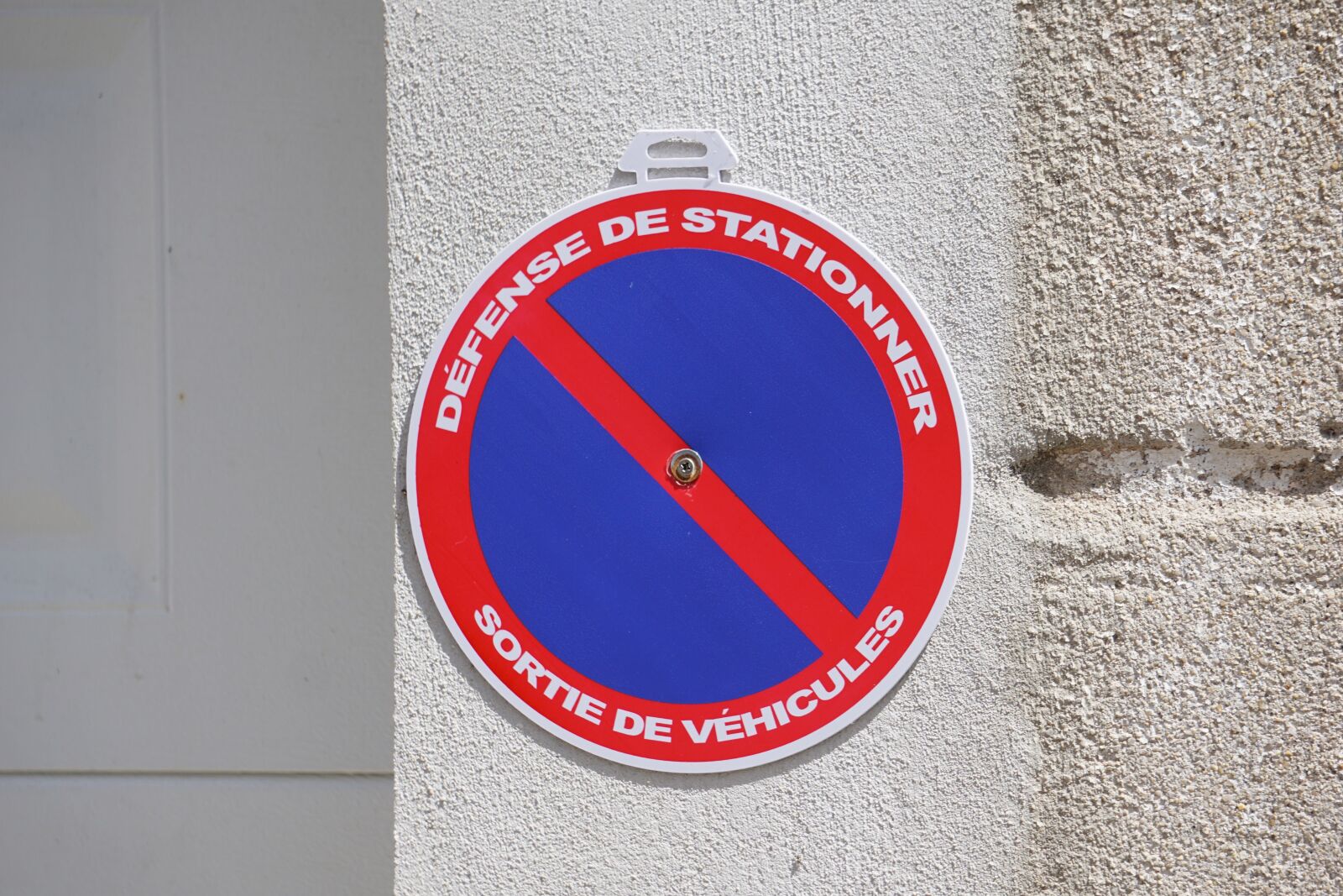 Sony E 55-210mm F4.5-6.3 OSS sample photo. Sign, street, traffic photography