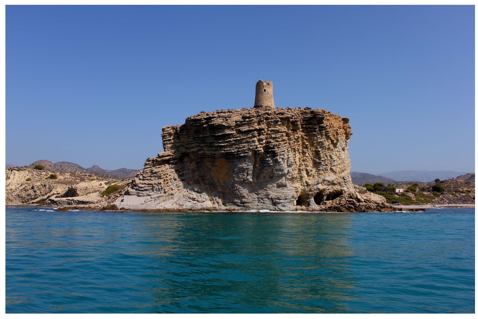 Canon EOS 500D (EOS Rebel T1i / EOS Kiss X3) sample photo. Landscape, sea, tower photography