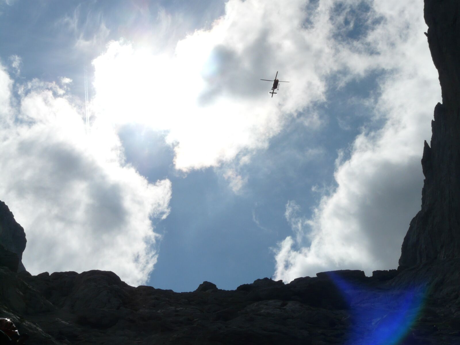 Panasonic DMC-FZ18 sample photo. Helicopter, mountains, clouds photography