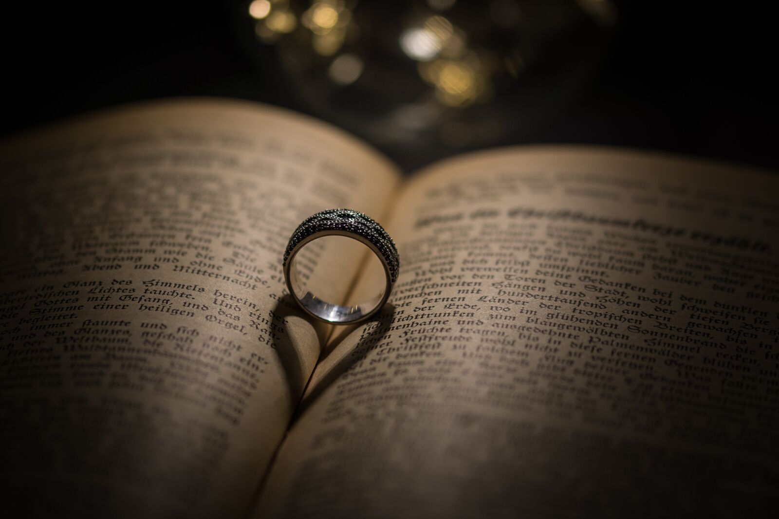 Sony SLT-A77 + 105mm F2.8 sample photo. Ring, heart, book photography