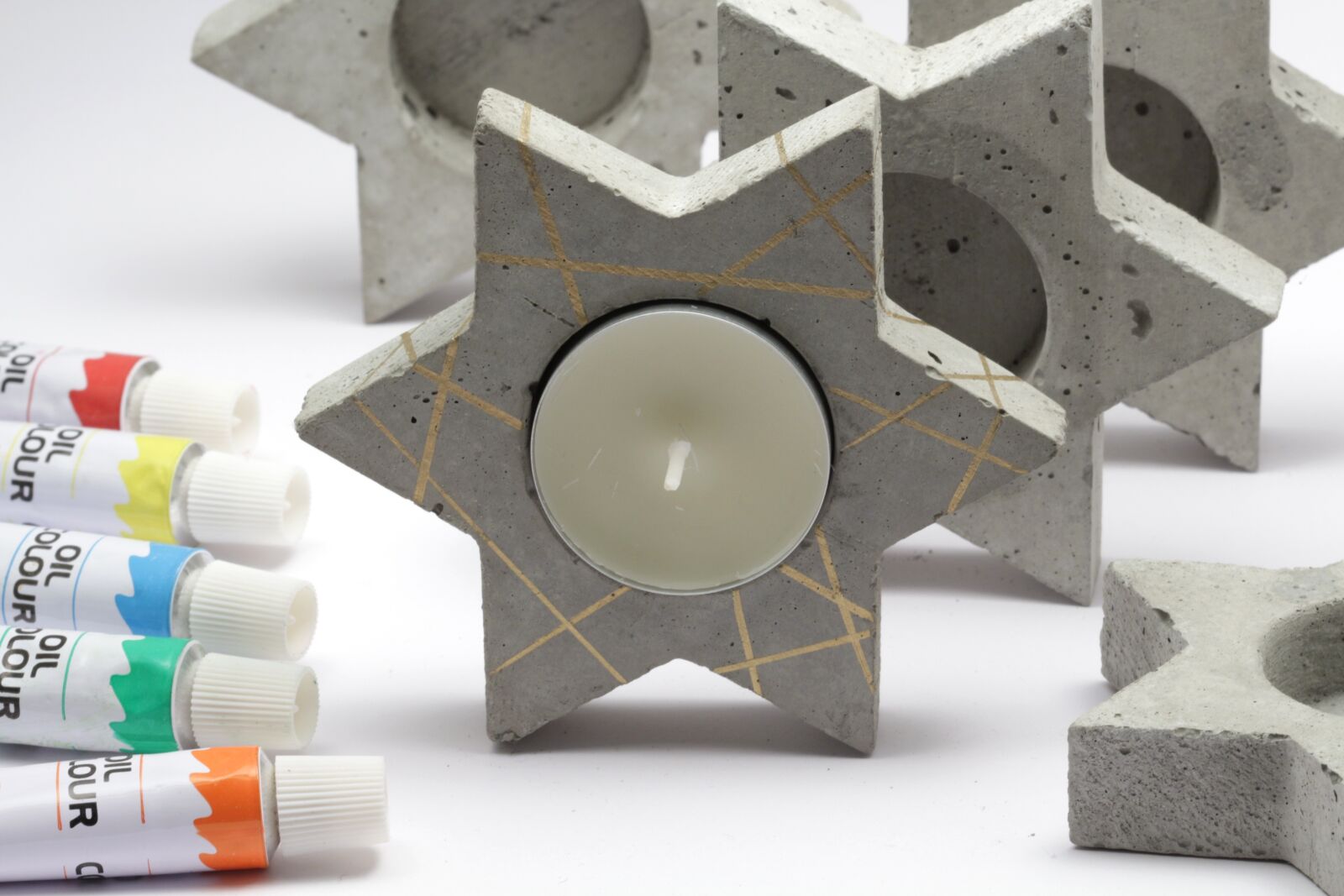 Canon EOS 700D (EOS Rebel T5i / EOS Kiss X7i) sample photo. Candle, concrete, painted photography