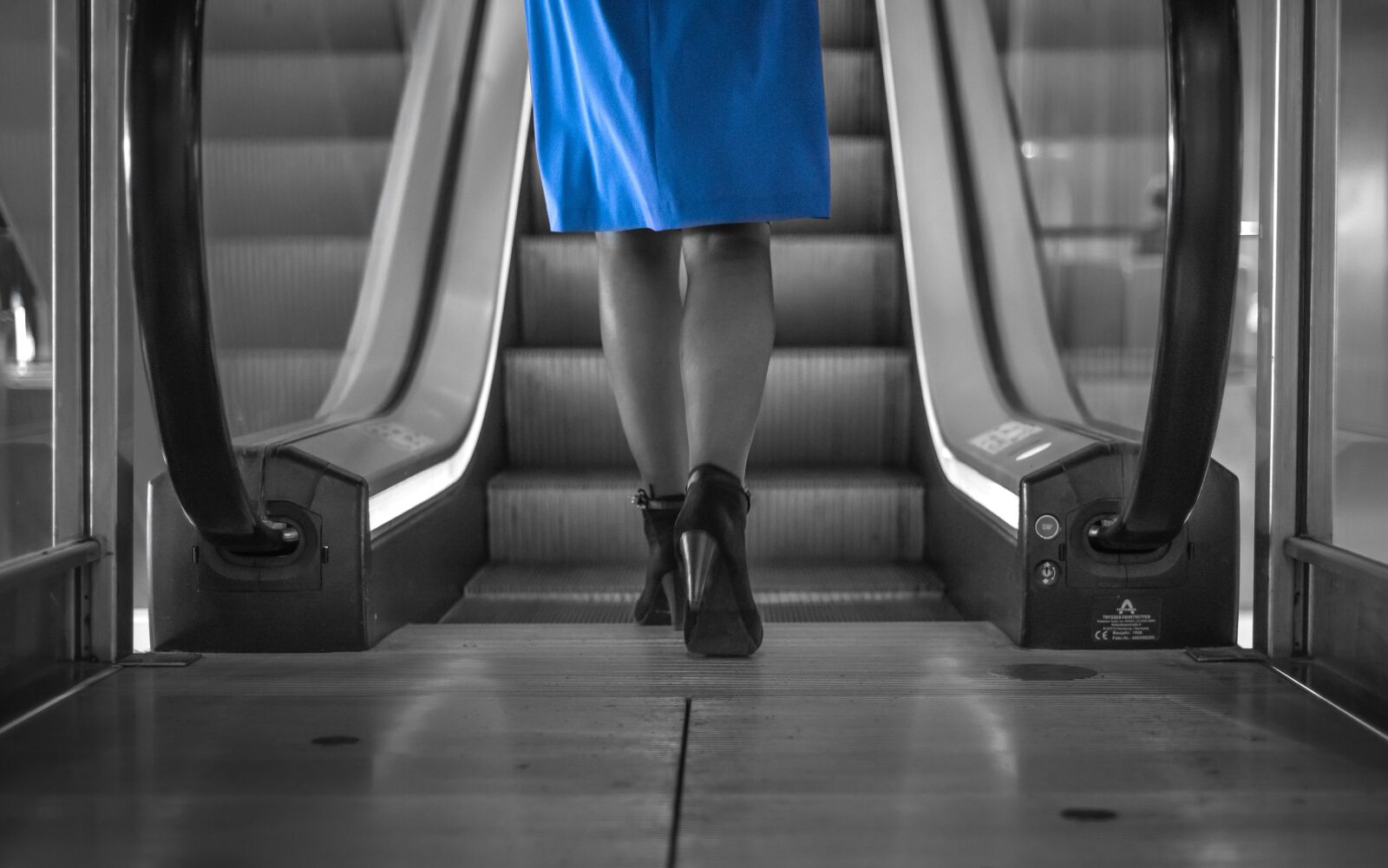 Nikon D610 sample photo. Woman, blue dress, escalator photography