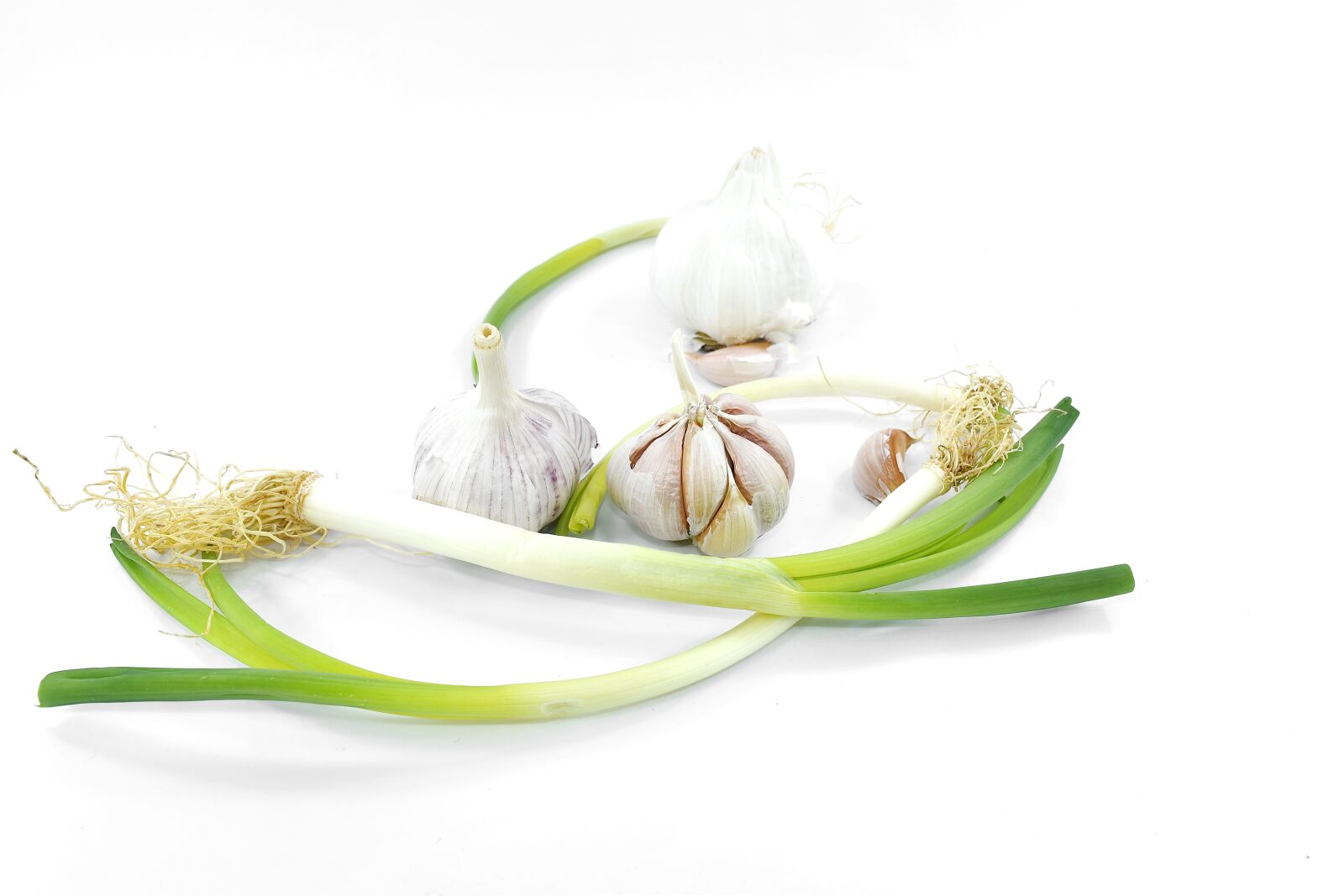 Nikon D5500 sample photo. Garlic, green leaves, organic photography