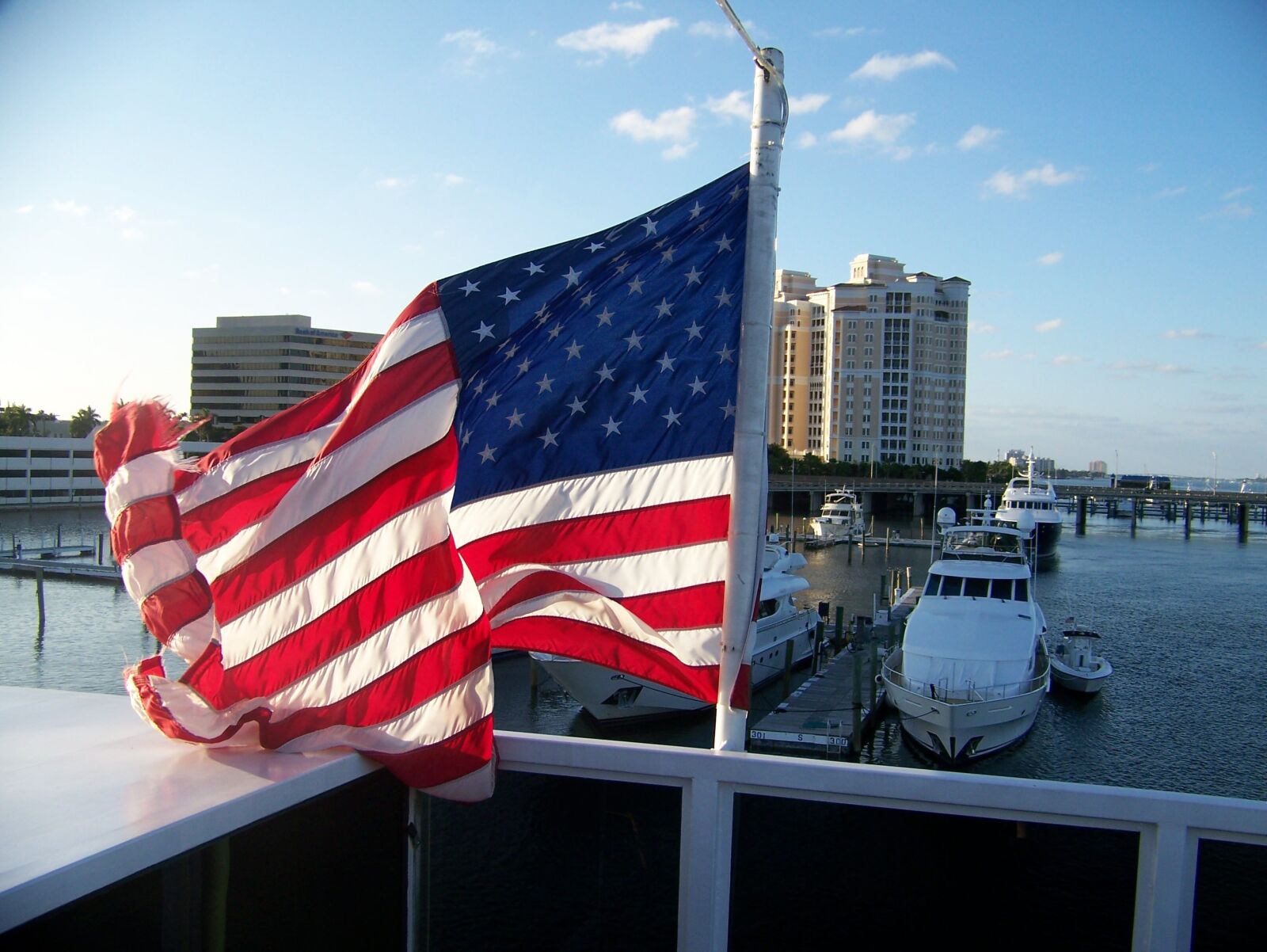 Kodak Z612 ZOOM DIGITAL CAMERA sample photo. American flag, water, city photography