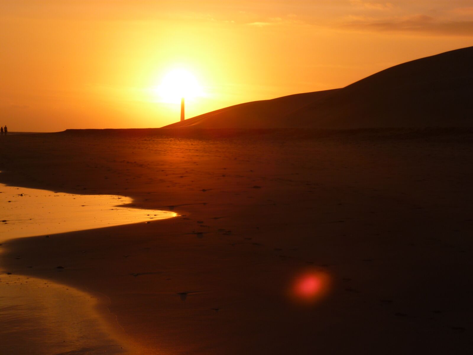 Panasonic DMC-FS10 sample photo. Sunset, beach, lighthouse photography