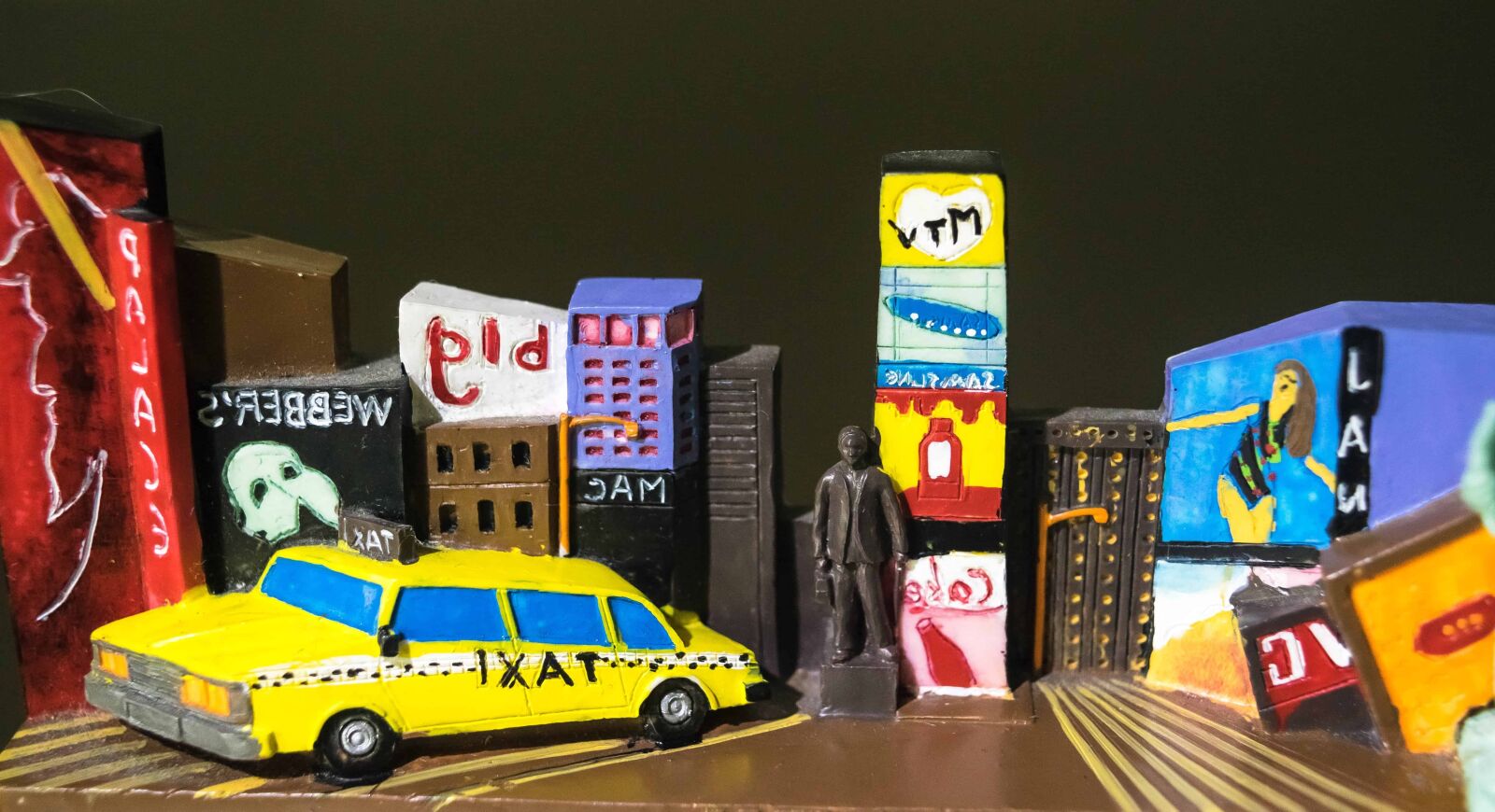 Nikon D3300 sample photo. Taxi, toy, figure, book photography