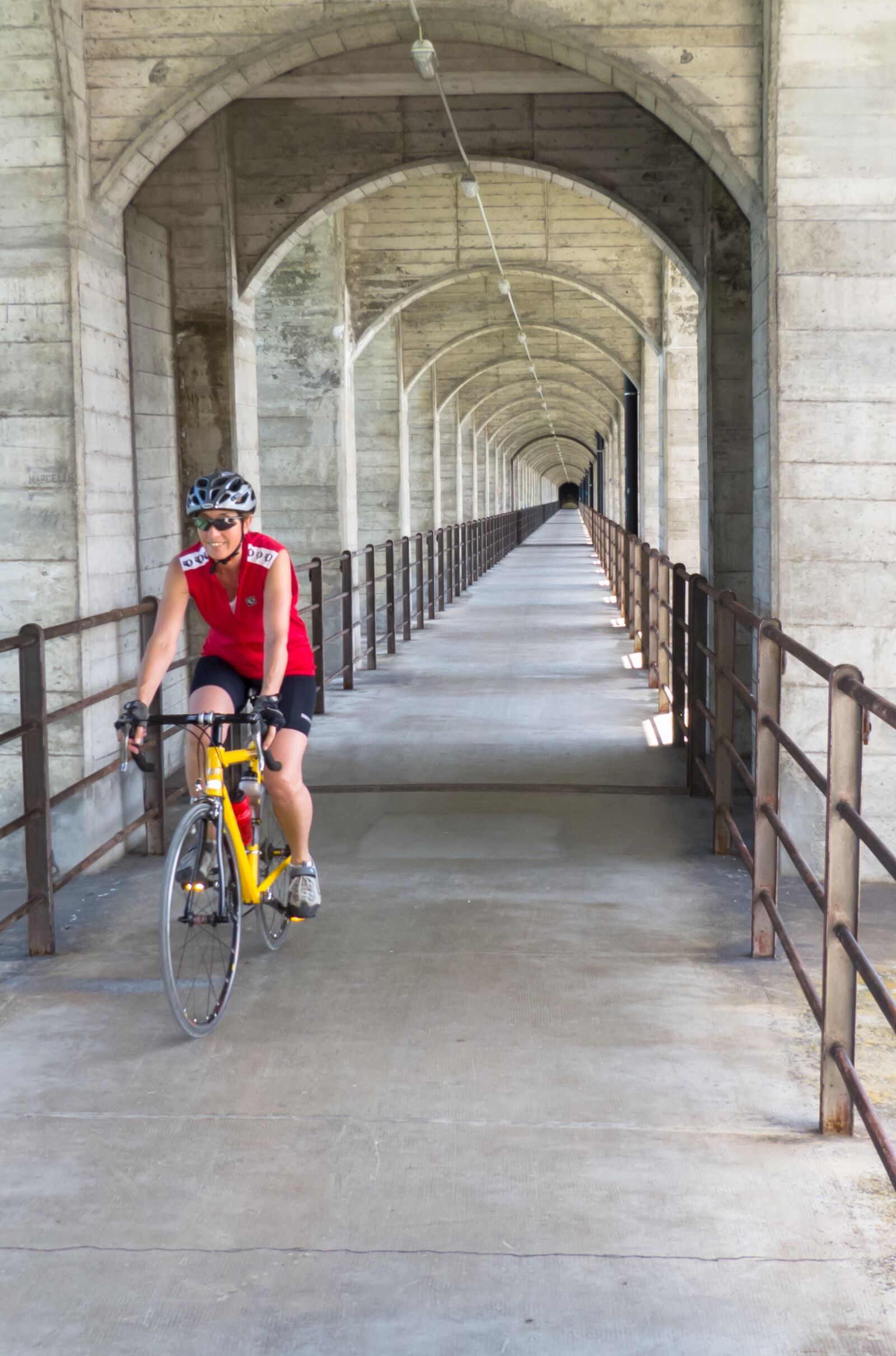 Panasonic Lumix DMC-FZ150 sample photo. Bike ride, bridge, cyclists photography