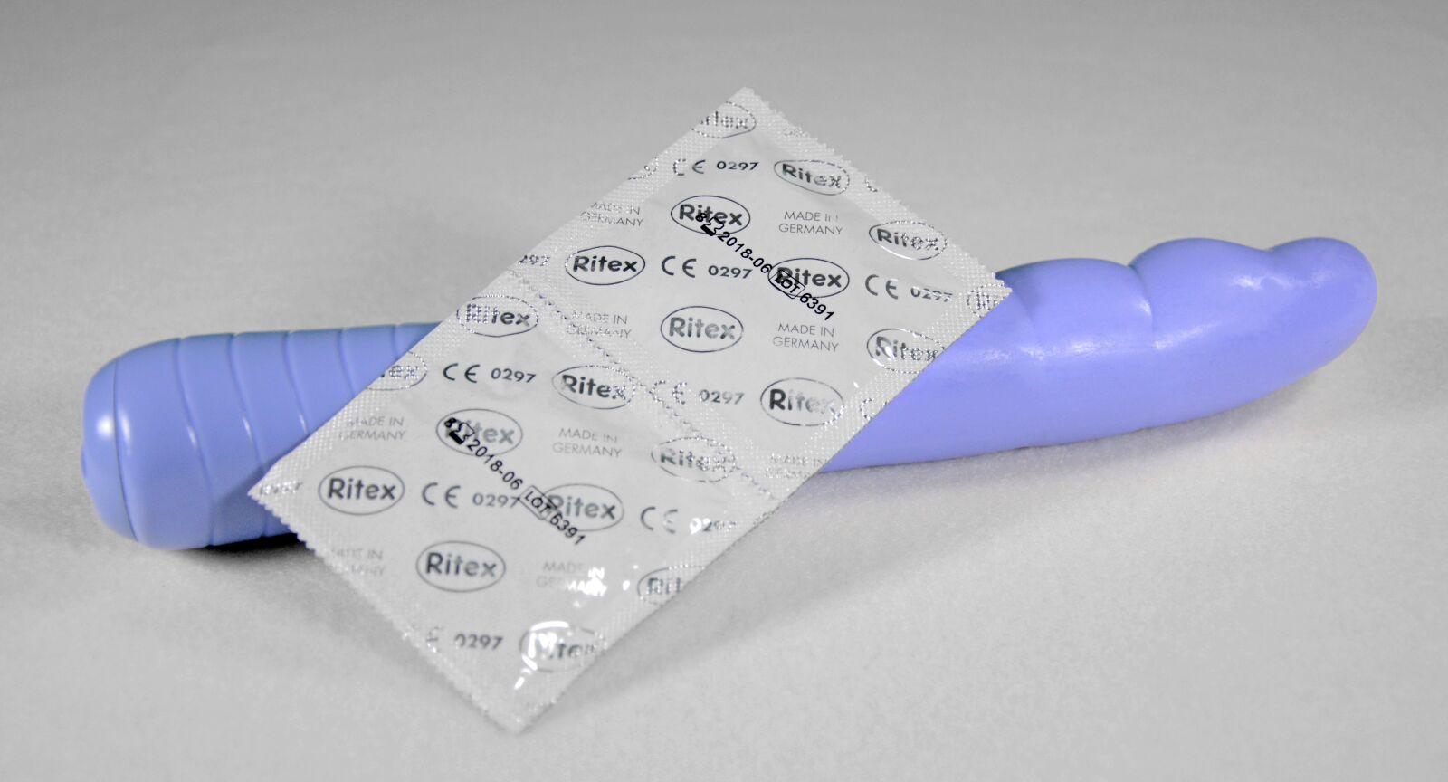 Nikon D5200 sample photo. Dildo, vibrator, condoms photography