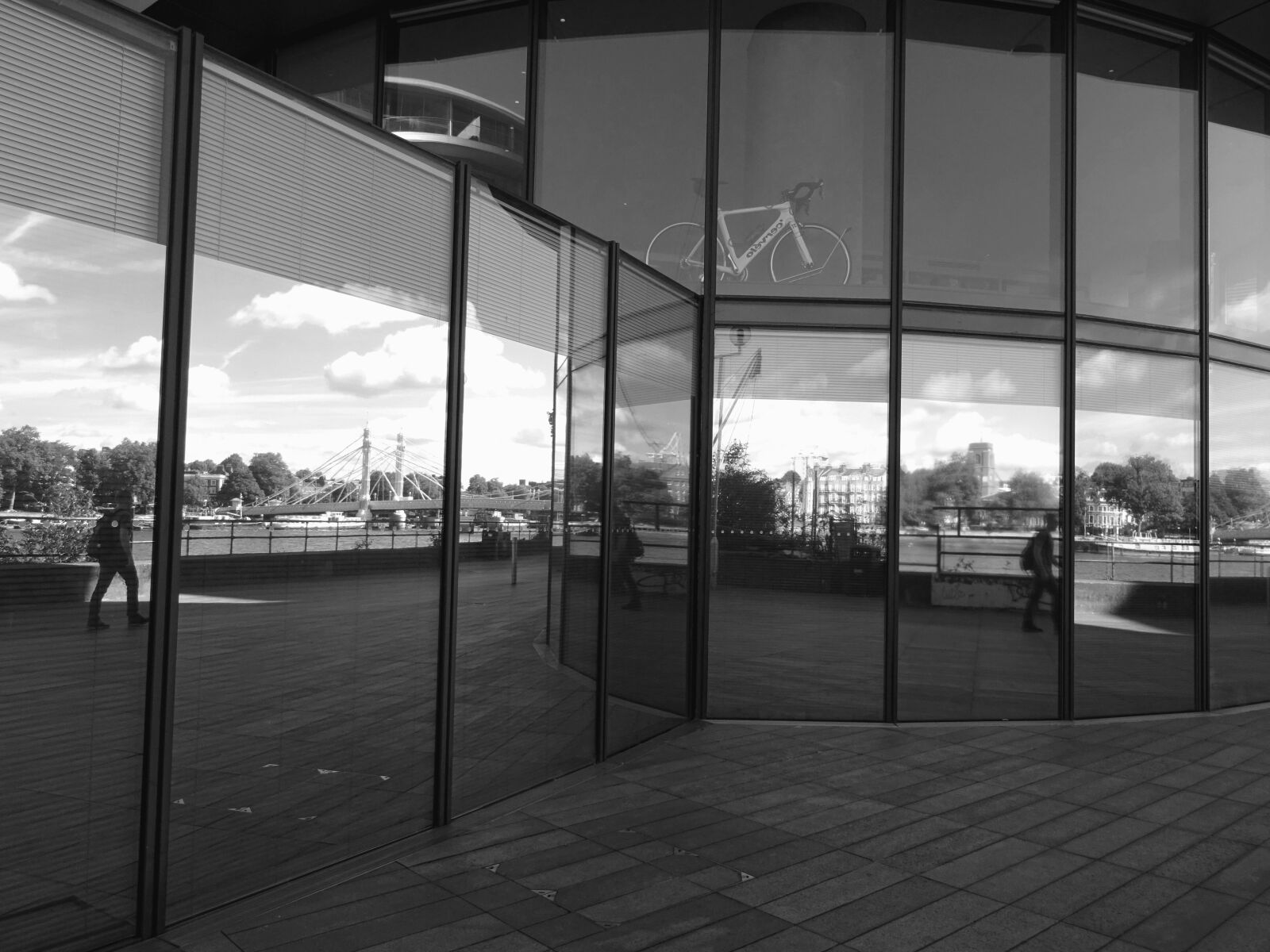 Sony DSC-HX60 sample photo. Building, glass, reflection, bicycles photography