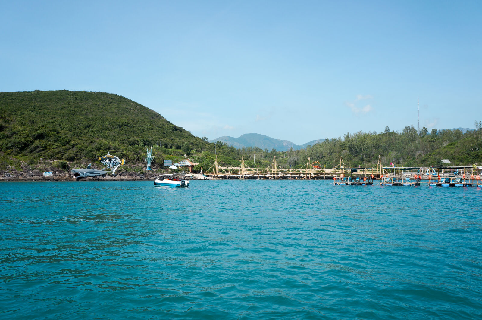 Sony Alpha NEX-5N sample photo. Bridge, island, mountain, sea photography