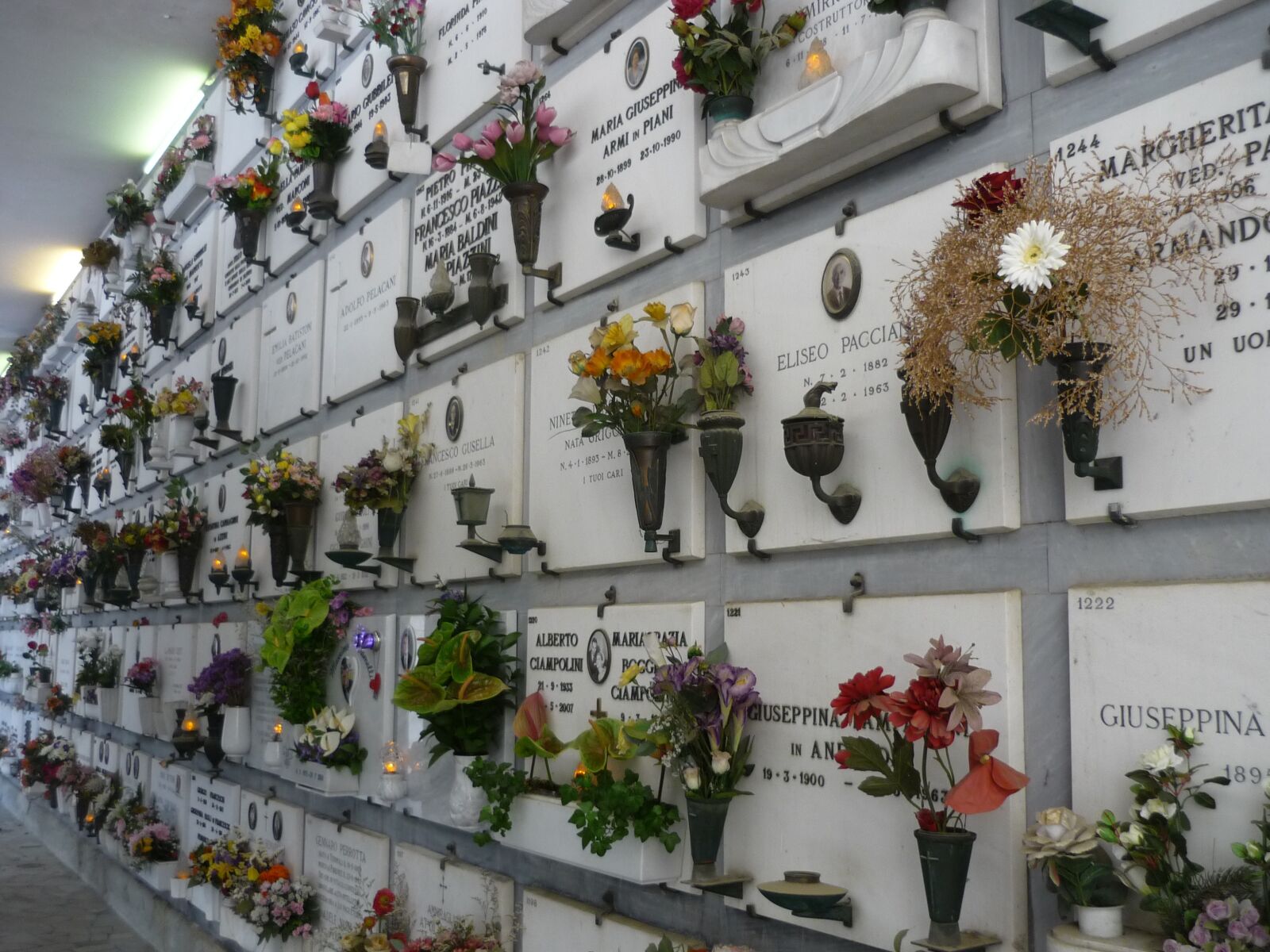 Panasonic Lumix DMC-FS3 sample photo. Urn tombs, flowers, cemetery photography