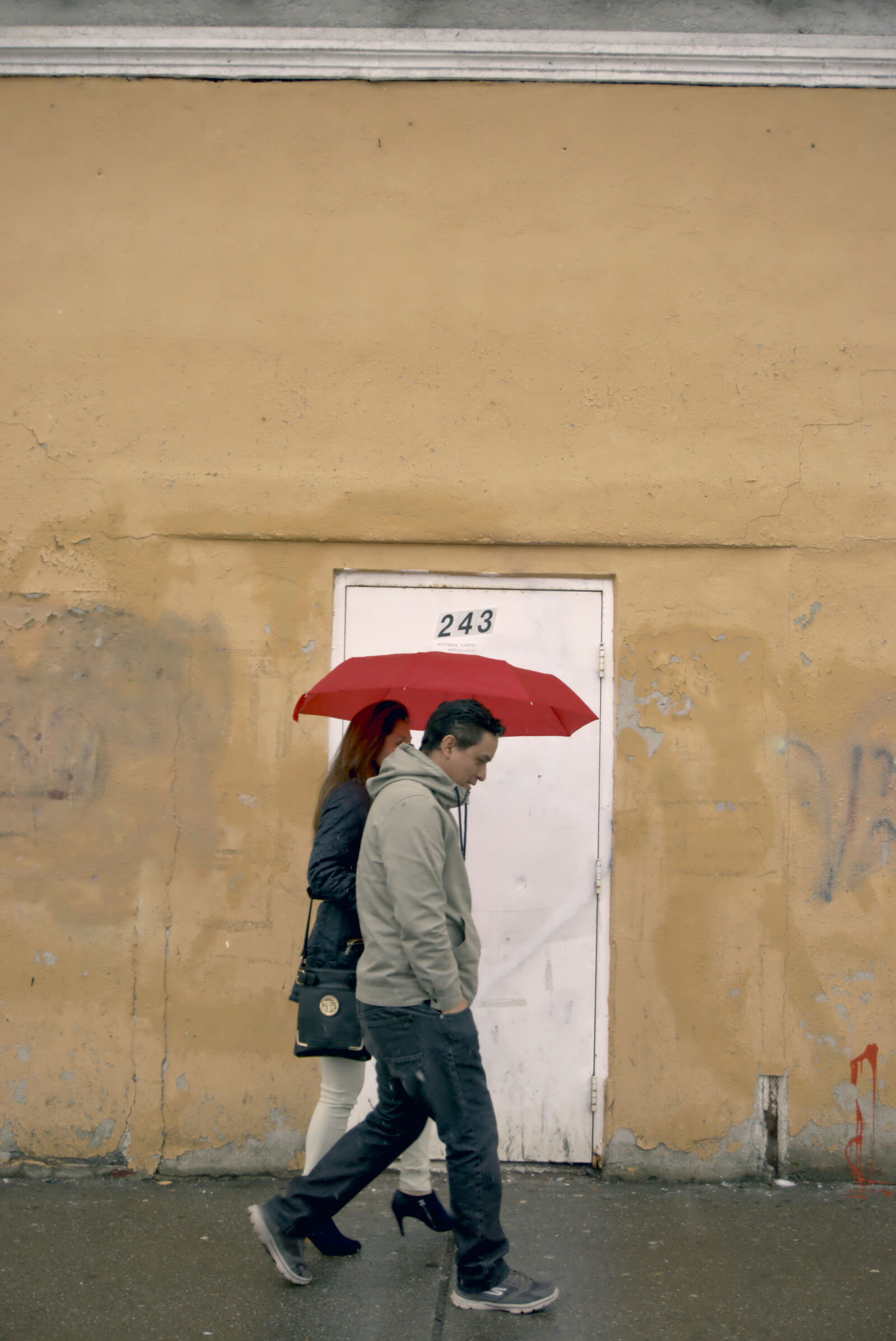 Sony a6000 sample photo. Couple, walking, door, red photography