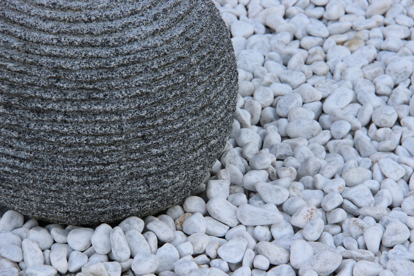 Canon EF-S 18-200mm F3.5-5.6 IS sample photo. Still life, pebble, grey photography
