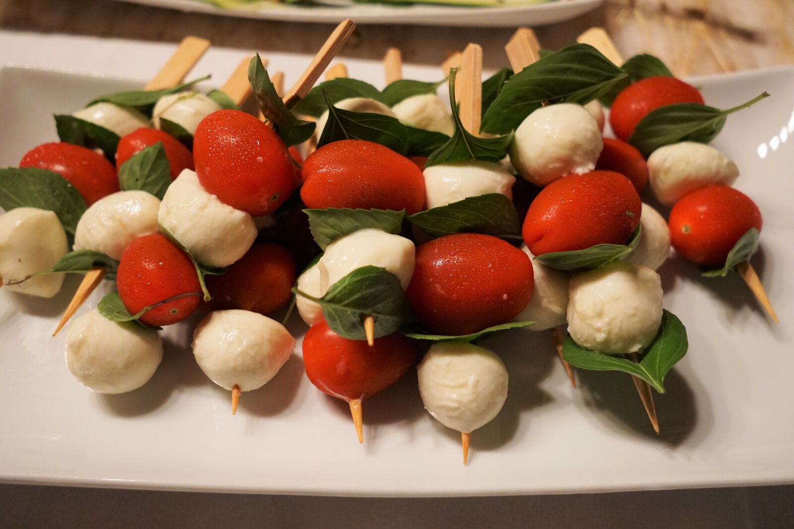 Sony a6000 + Sigma 19mm F2.8 EX DN sample photo. Tomatoes, mozzarella, skewers photography