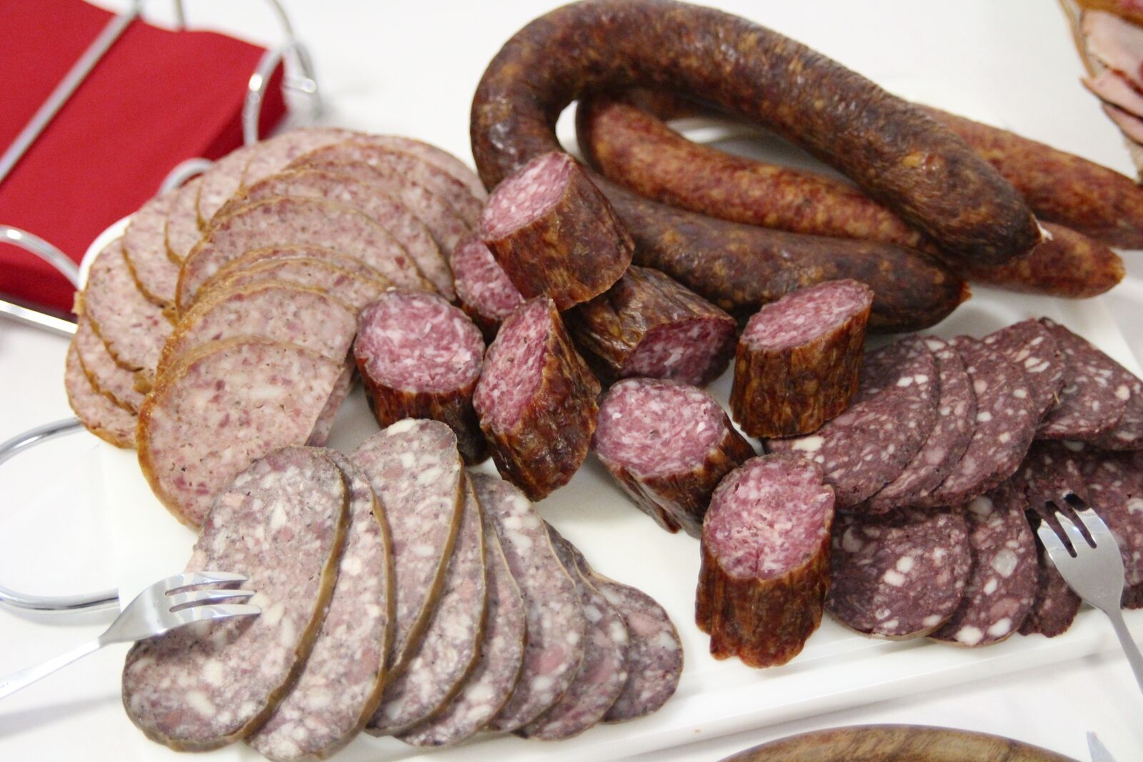 Canon EOS 100D (EOS Rebel SL1 / EOS Kiss X7) sample photo. Sausage, feast, blood sausage photography