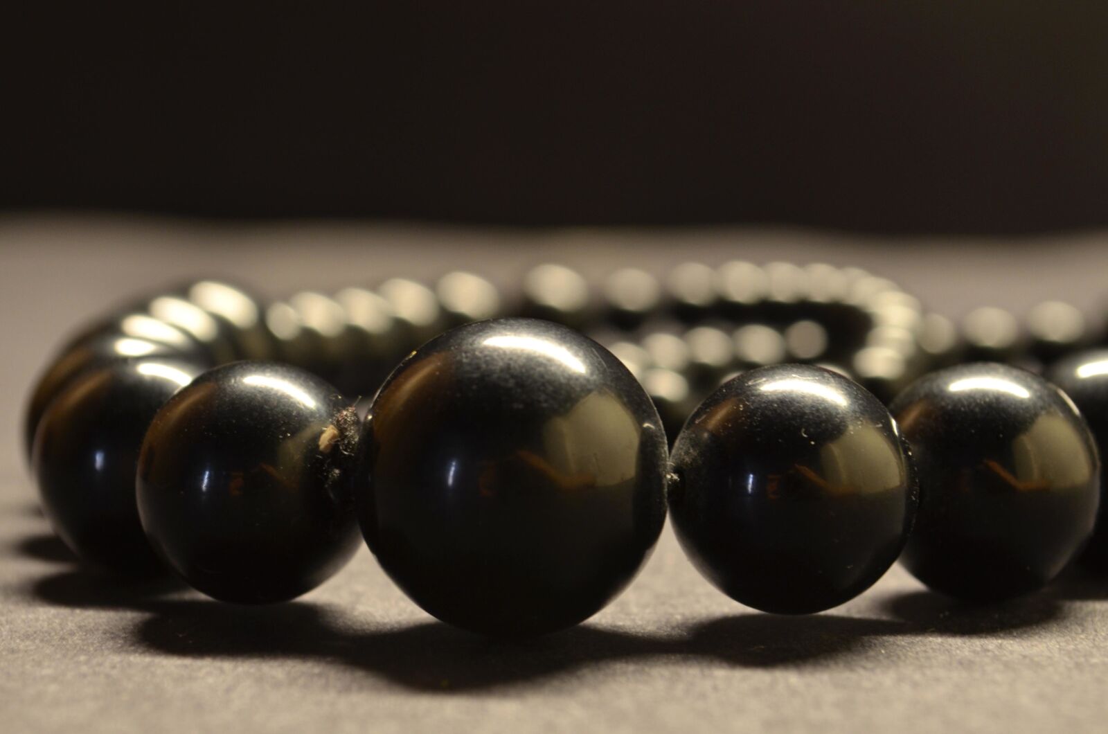 Nikon D5100 sample photo. Bracelet, black stone, jewelry photography