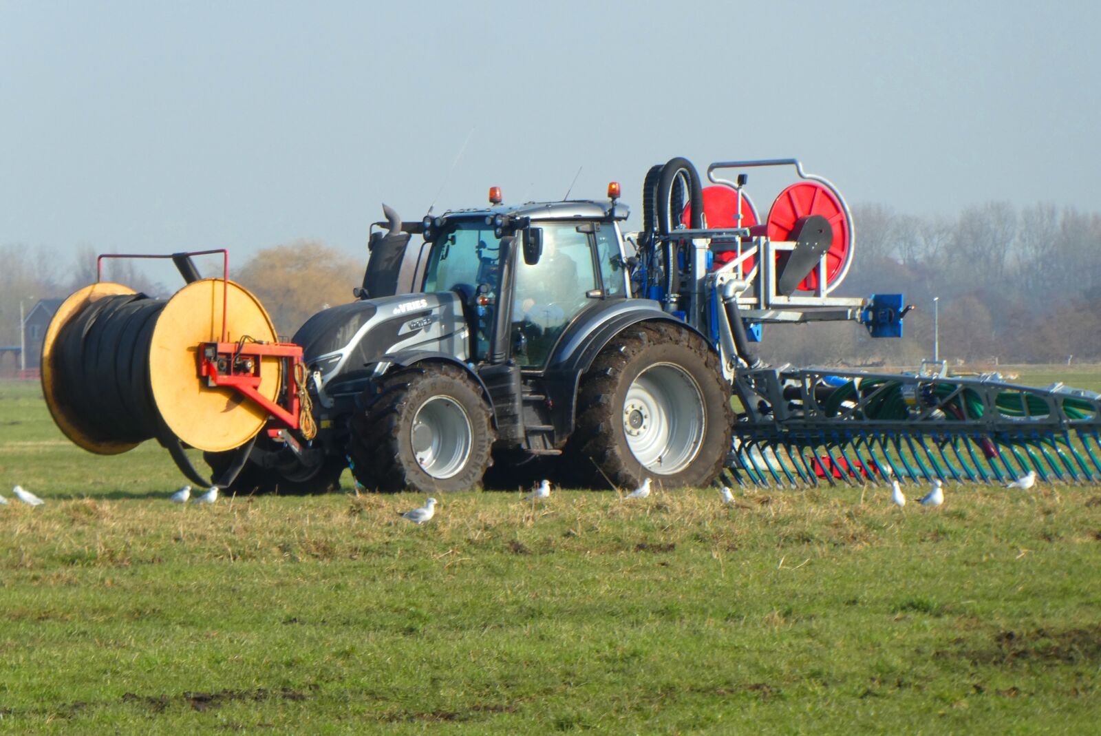 Panasonic Lumix DC-ZS70 (Lumix DC-TZ90) sample photo. Tractor, manure spreading, injecting photography