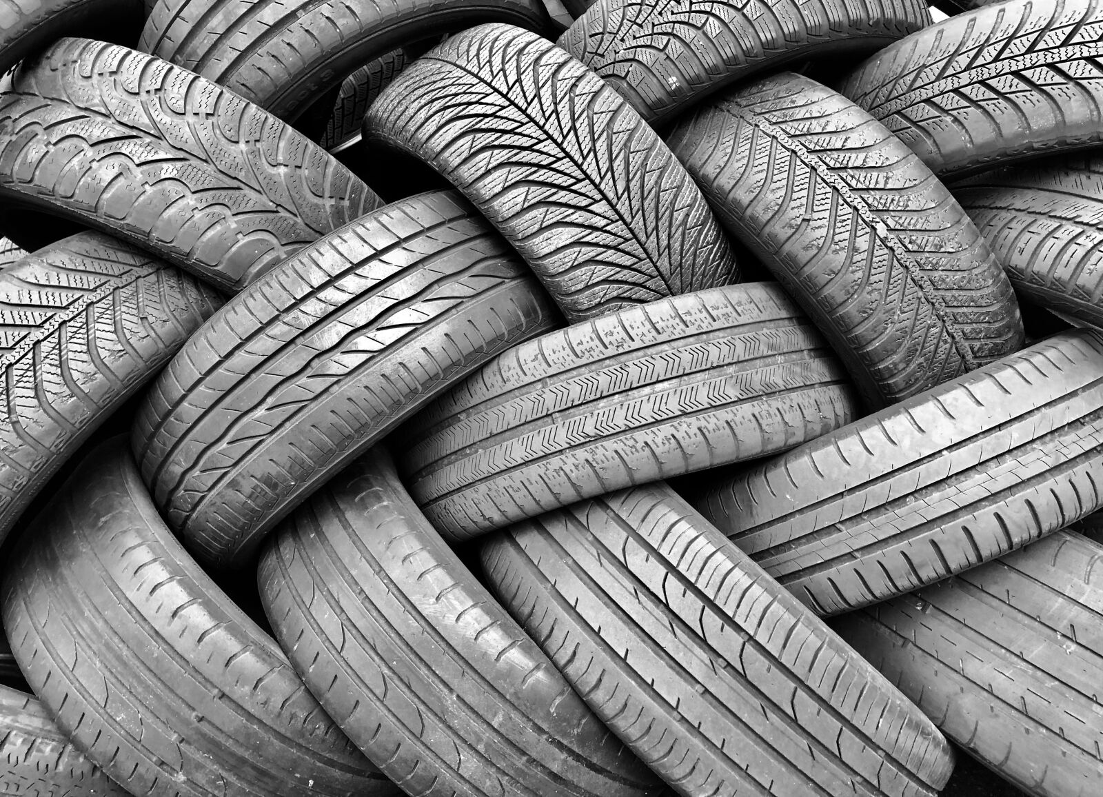 iPhone X back dual camera 4mm f/1.8 sample photo. Auto tires, background, rubber photography