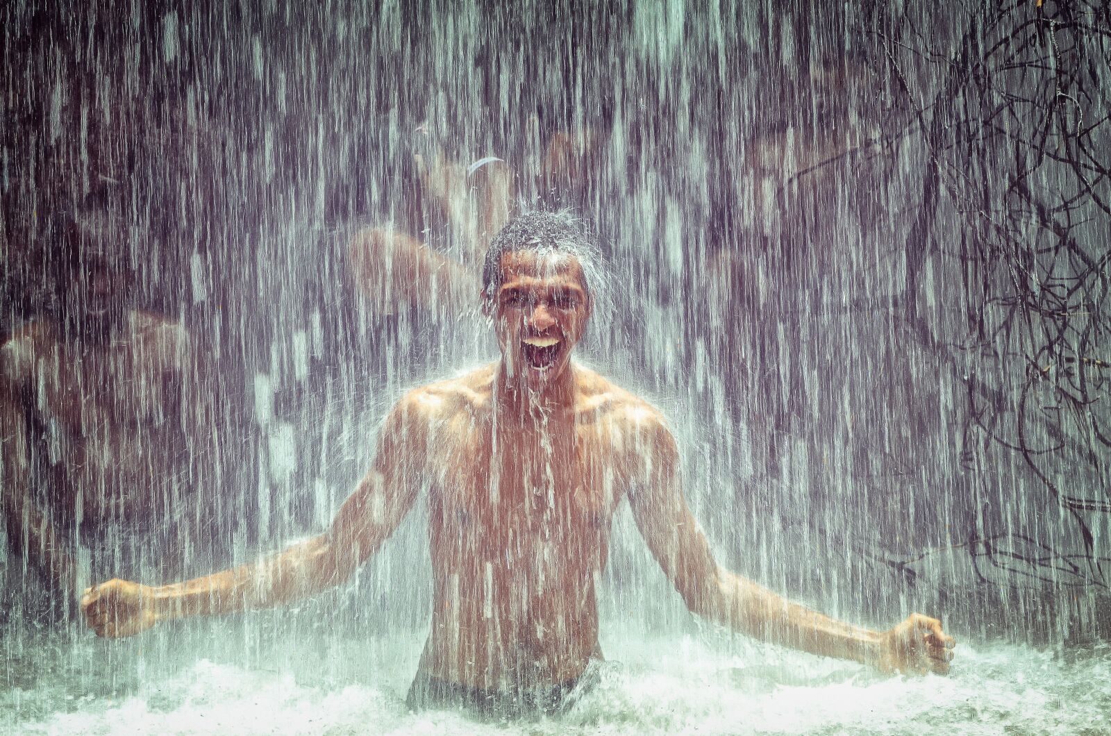 Nikon D5100 sample photo. Man under waterfall, waterfall photography