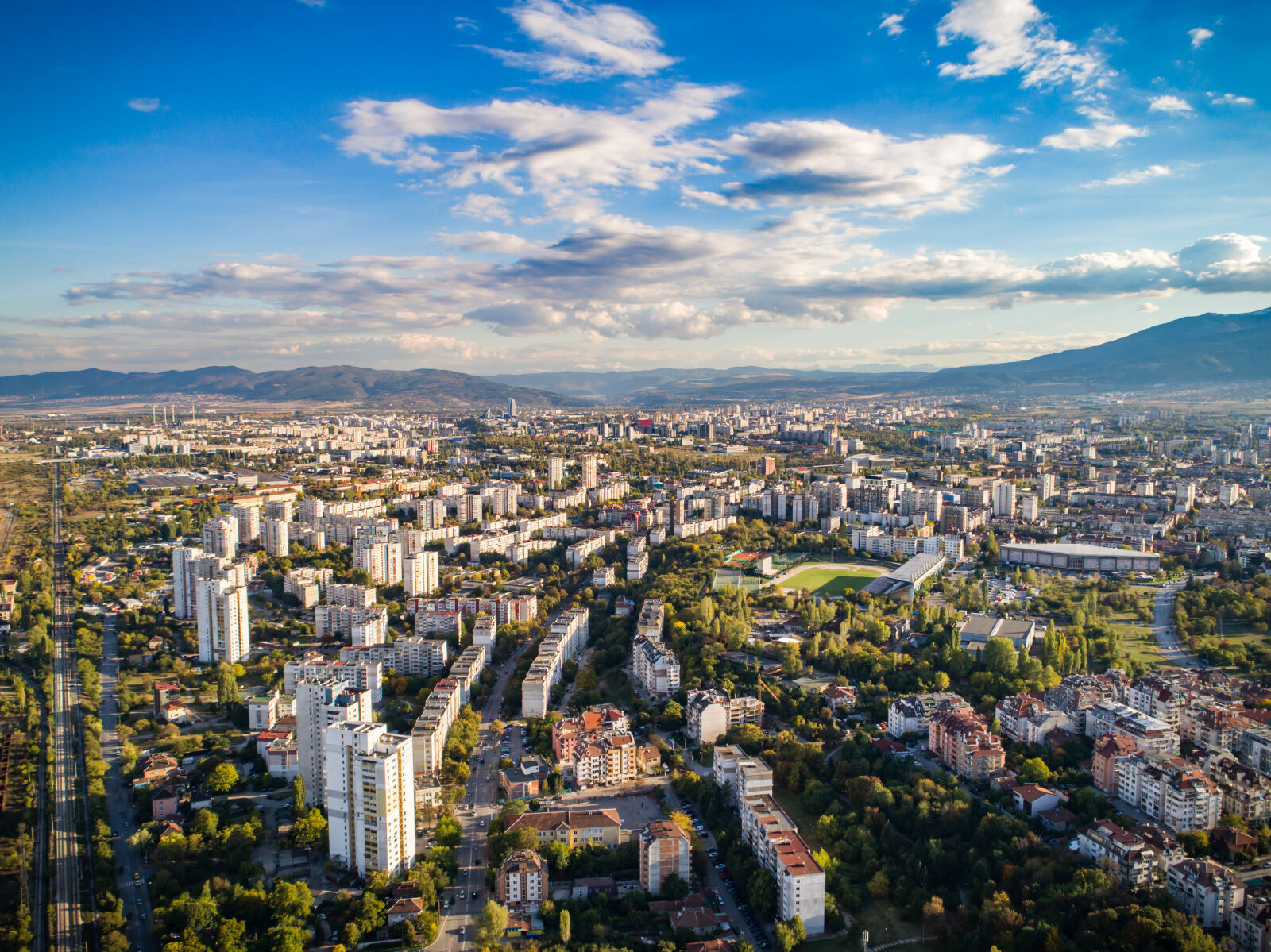 DJI FC6310 sample photo. Apartment, buildings, autumn, blue photography