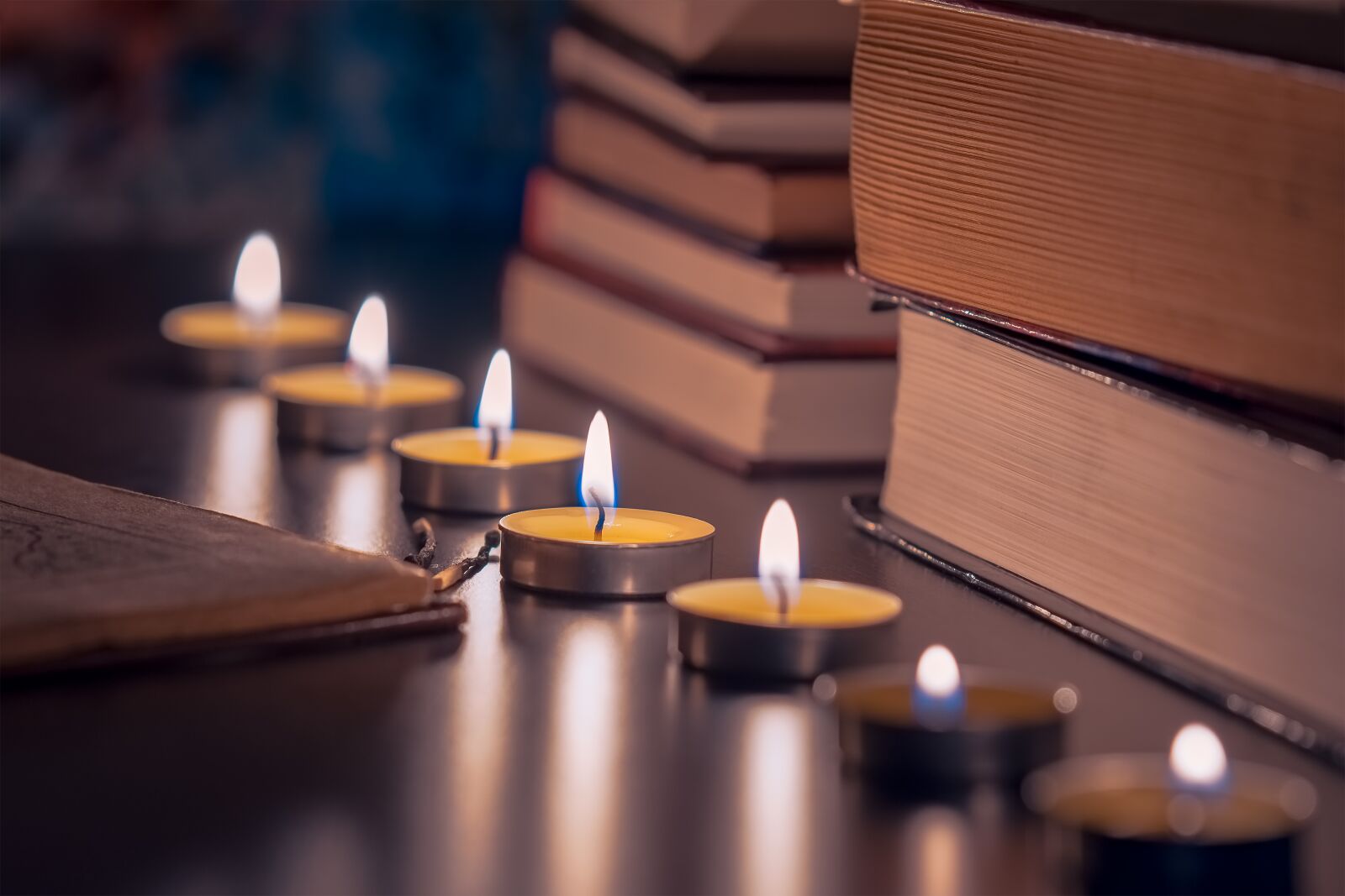 Nikon D7200 sample photo. Candles, table, books photography