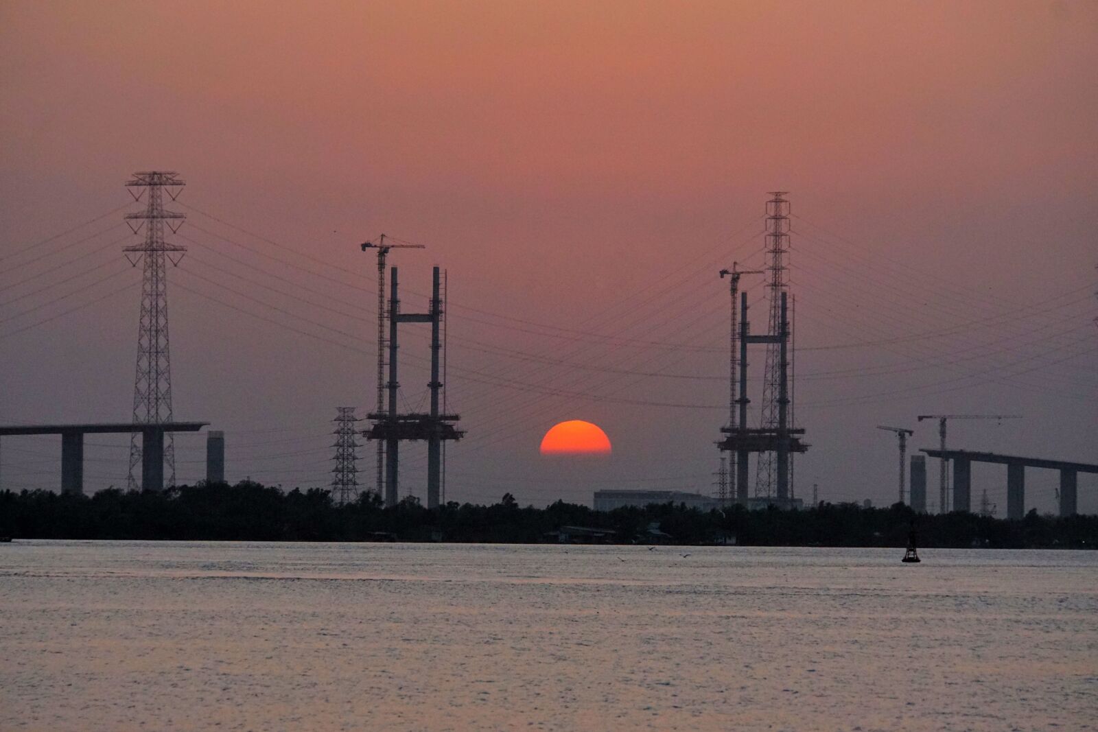Sony E 18-200mm F3.5-6.3 OSS sample photo. Bridge, sunset, river photography