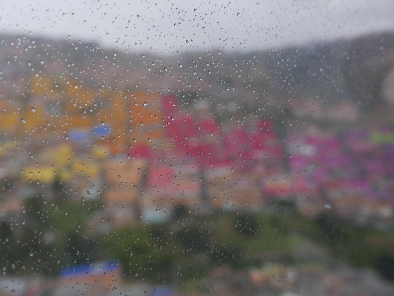 Panasonic Lumix DMC-LX100 sample photo. Rainy day, city through photography