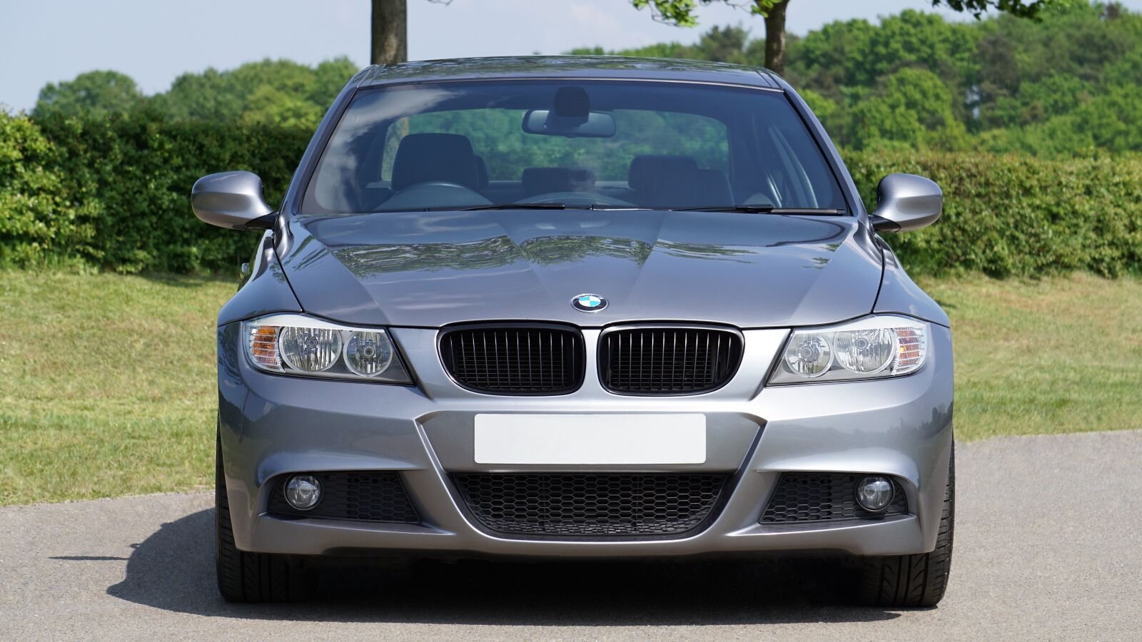 Sony E 55-210mm F4.5-6.3 OSS sample photo. Car, bmw, vehicle photography
