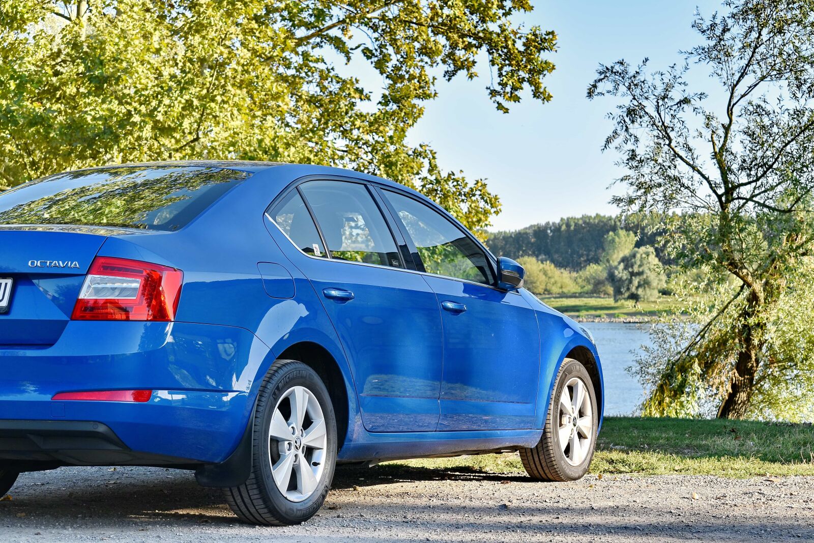 Nikon D5500 sample photo. Blue, bumper, riverbank, sedan photography