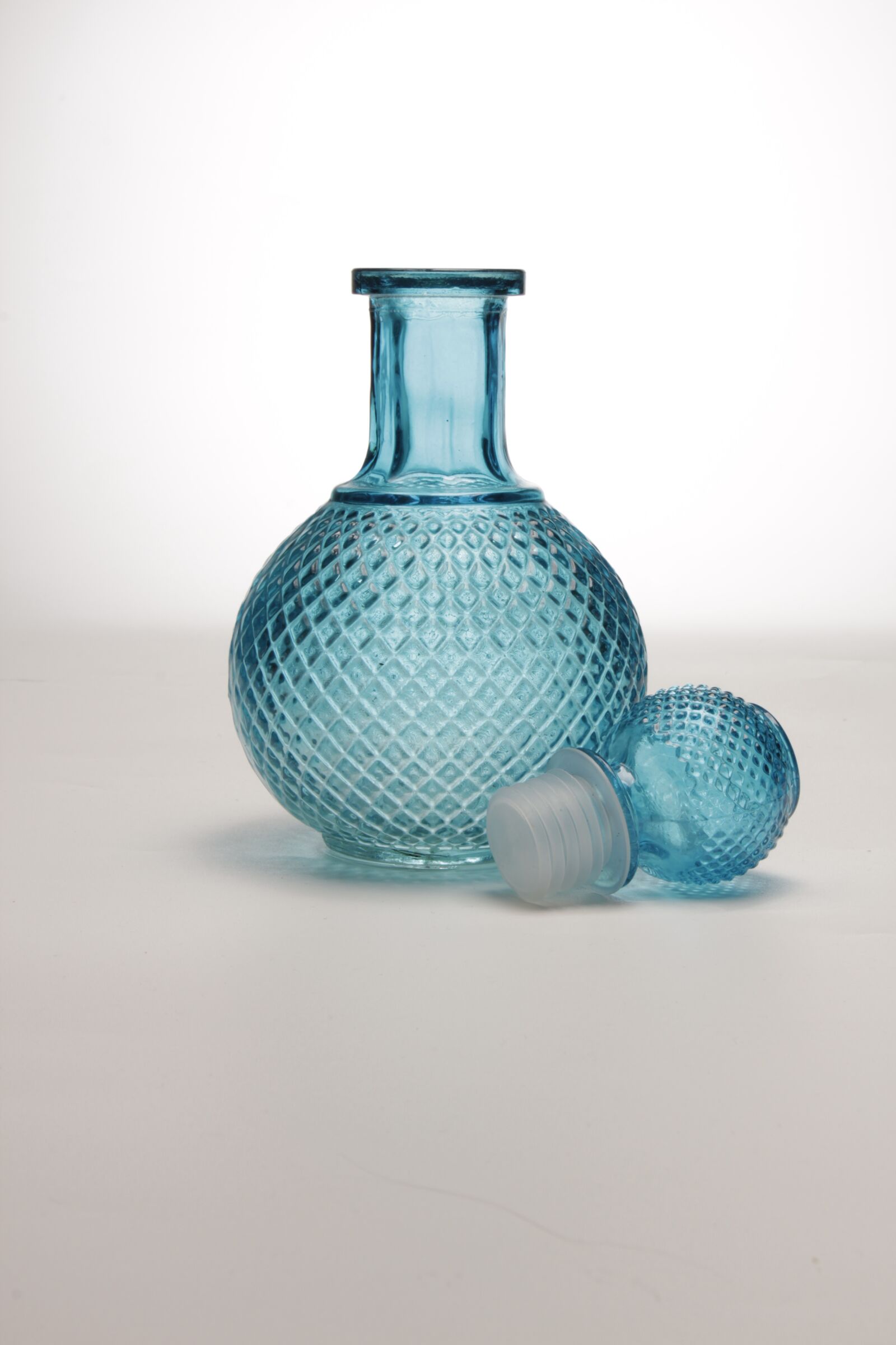 Canon EOS 1200D (EOS Rebel T5 / EOS Kiss X70 / EOS Hi) sample photo. Bottle, blue, glass photography