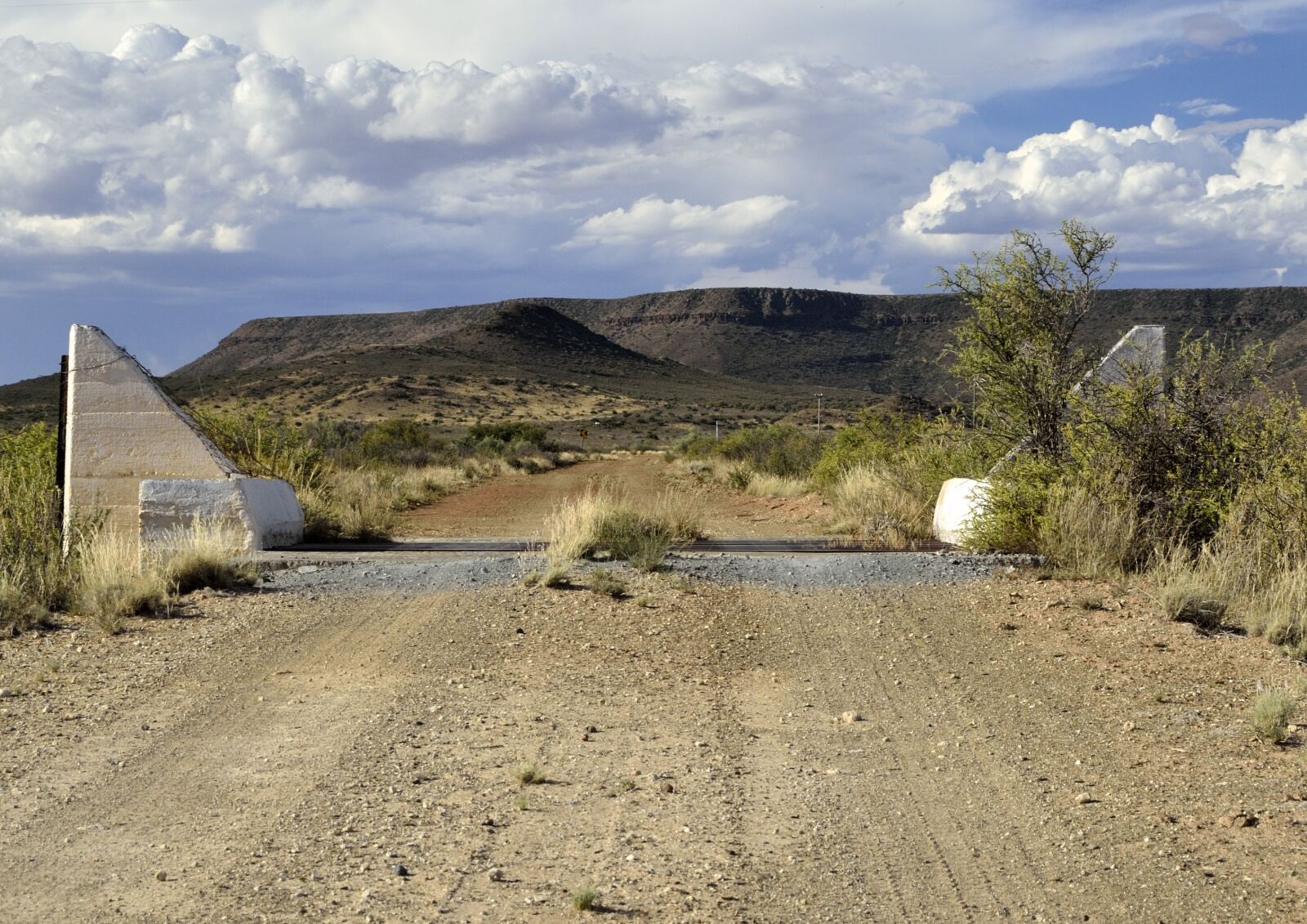 Nikon D5100 sample photo. Clouds, road, day photography