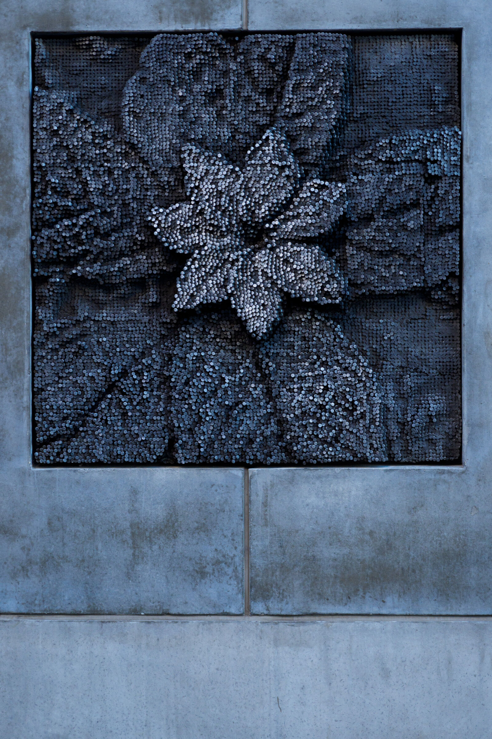 Olympus M.Zuiko Digital ED 12-45mm F4 Pro sample photo. Concrete metal flower photography