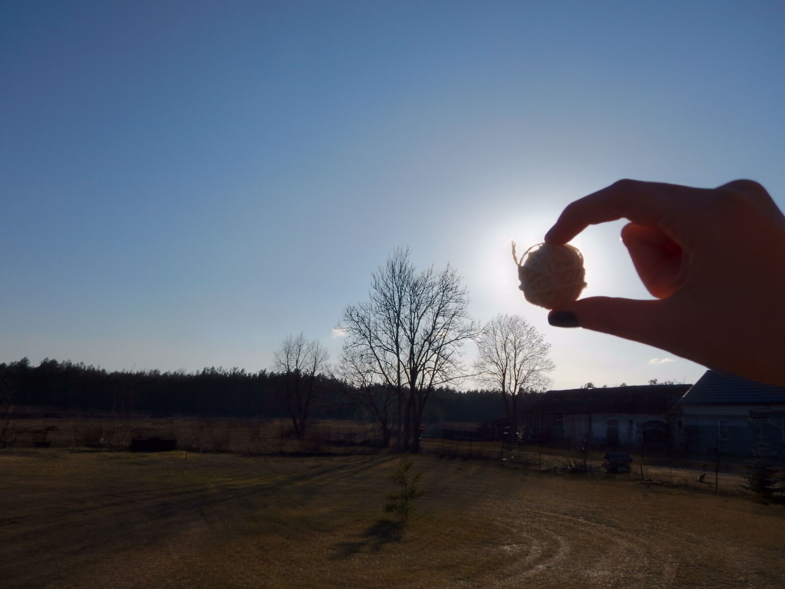 Nikon Coolpix AW130 sample photo. Hand, house, light, outside photography