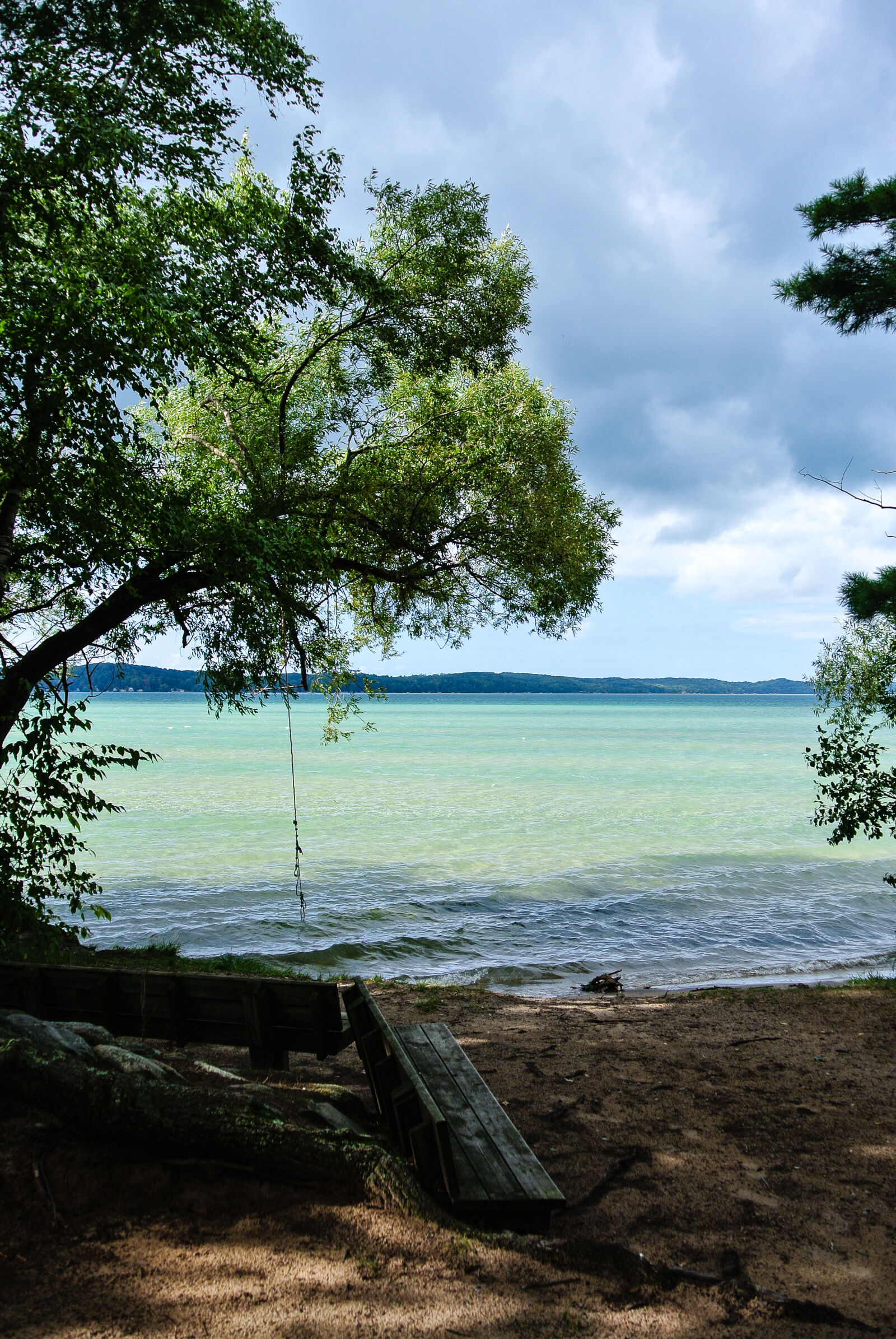 Nikon 1 Nikkor VR 10-30mm F3.5-5.6 sample photo. Bench, crystal, clear, lake photography