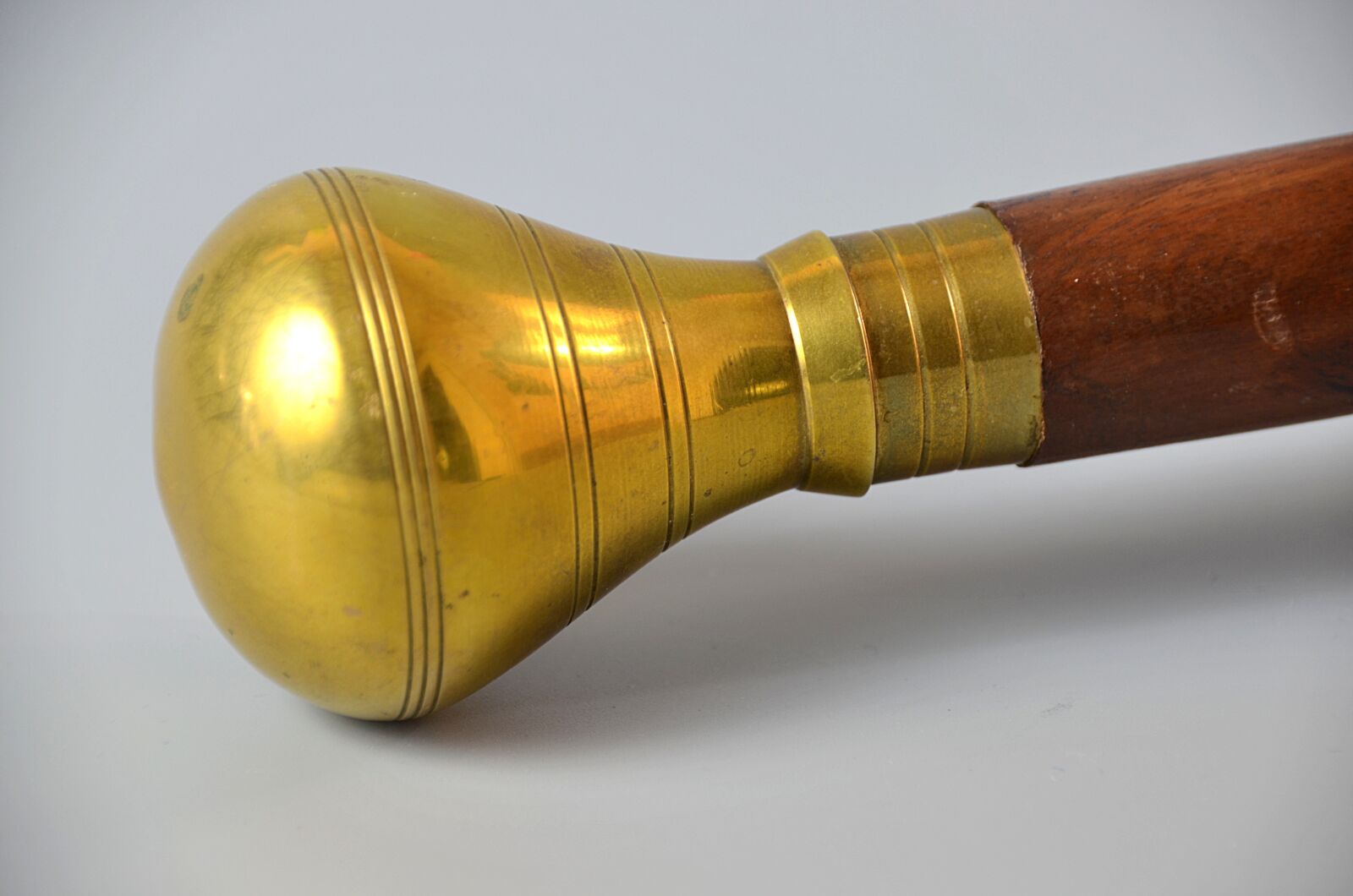 Nikon D5100 sample photo. Cane, knob, brass photography