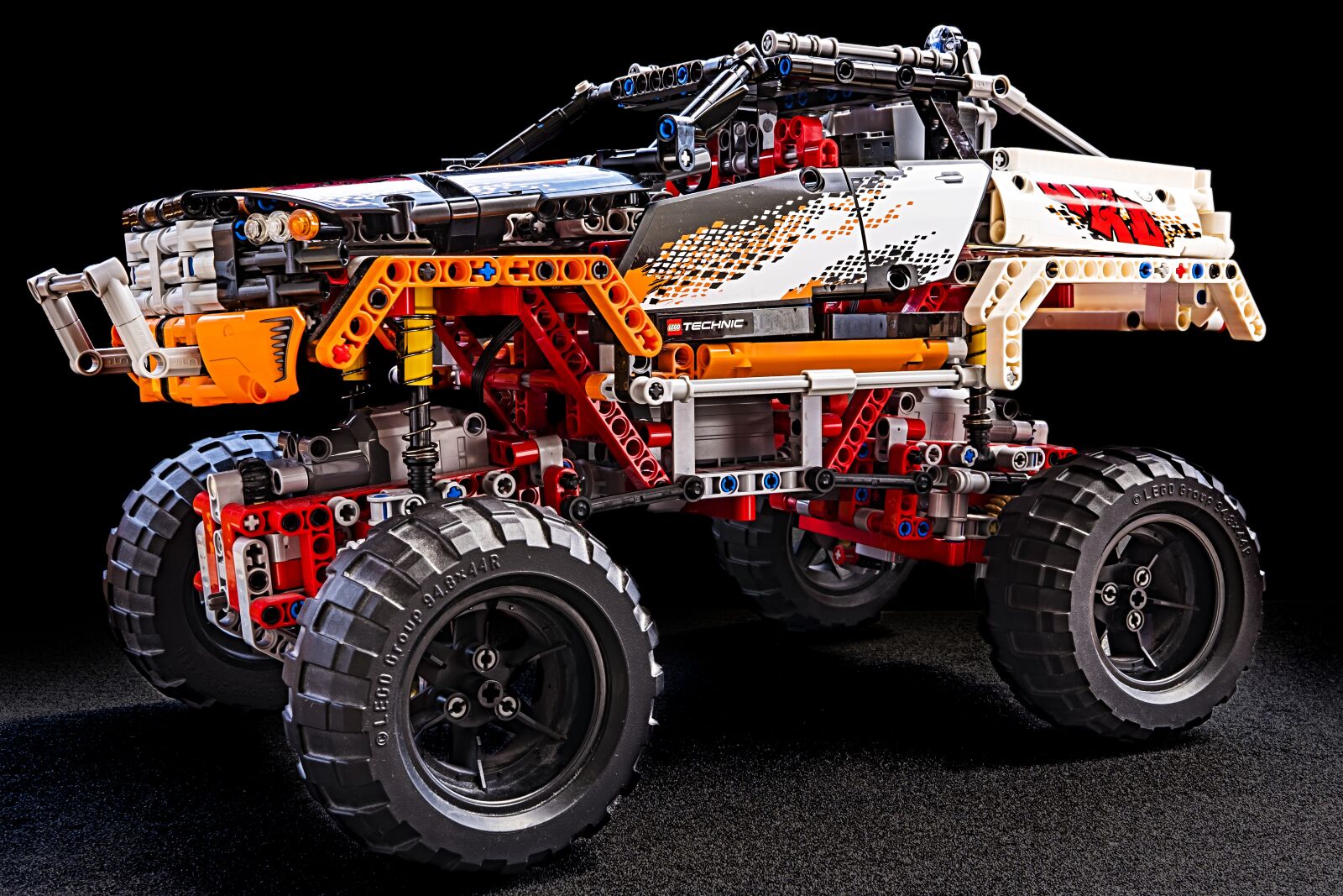 Sony a6300 + Sigma 30mm F2.8 EX DN sample photo. Monster truck, lego technic photography