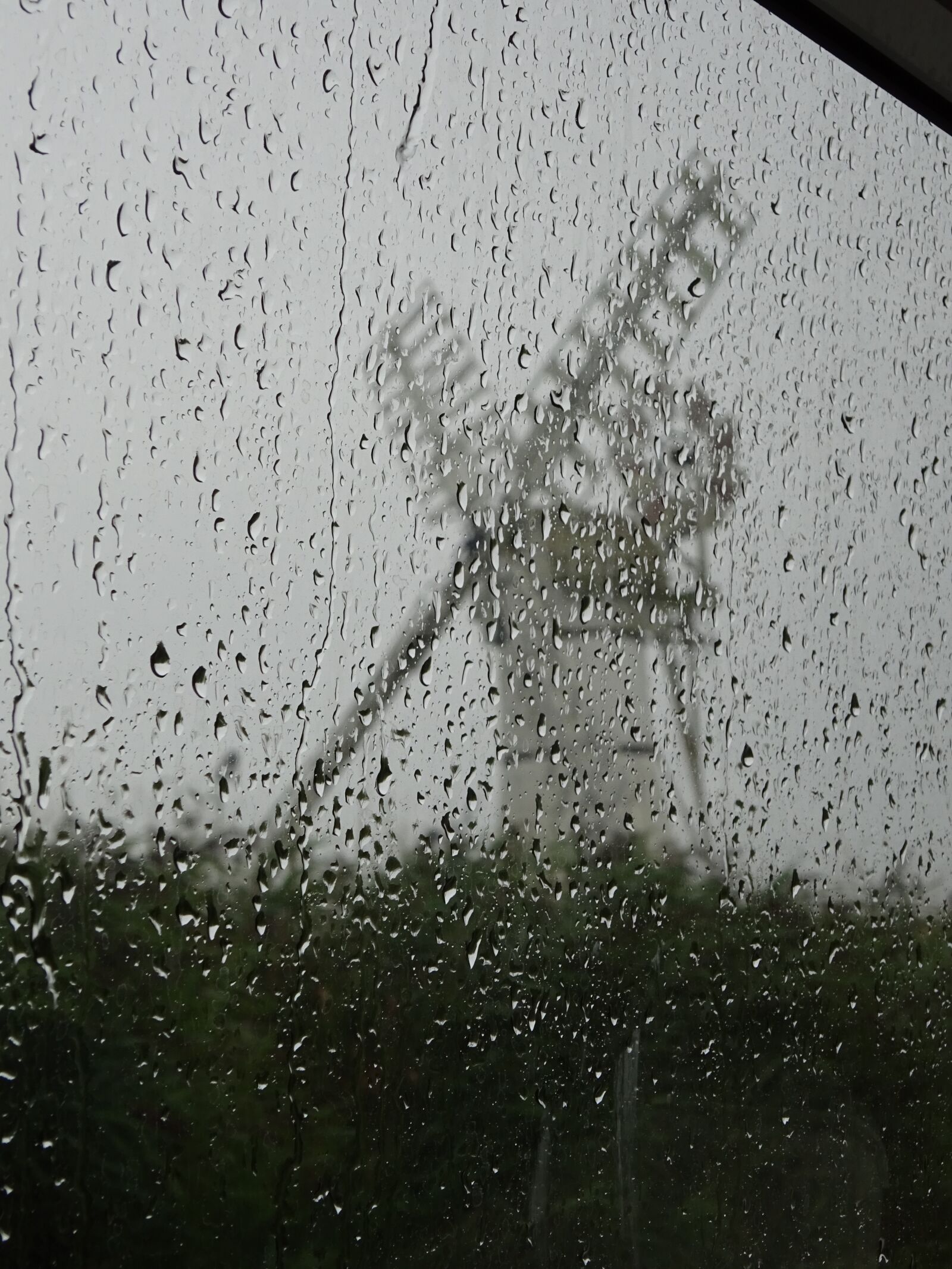 Sony Cyber-shot DSC-WX350 sample photo. Windmill, white windmill, rainy photography