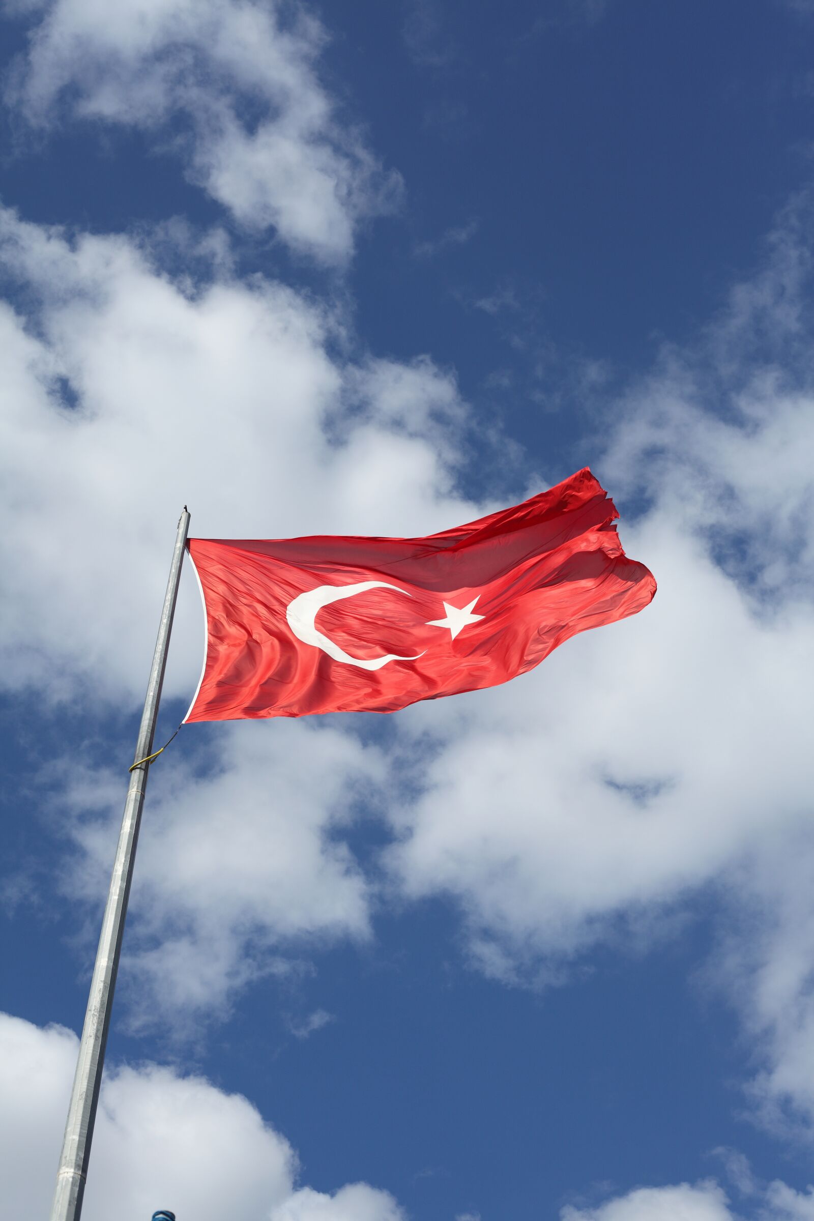 Canon EOS 5D Mark II sample photo. Flag, red, moon and photography