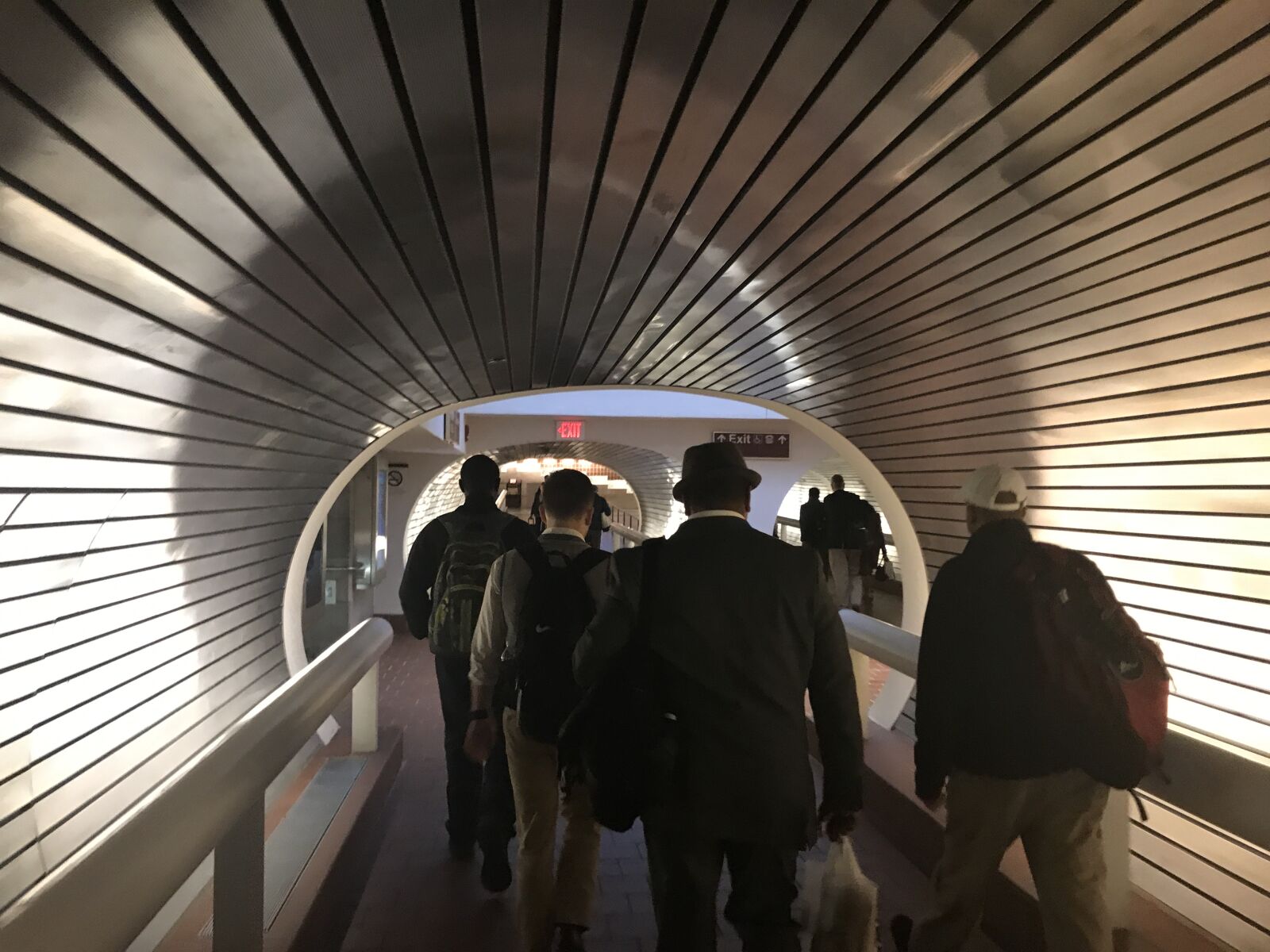 iPhone 7 back camera 3.99mm f/1.8 sample photo. People, walking, train, station photography