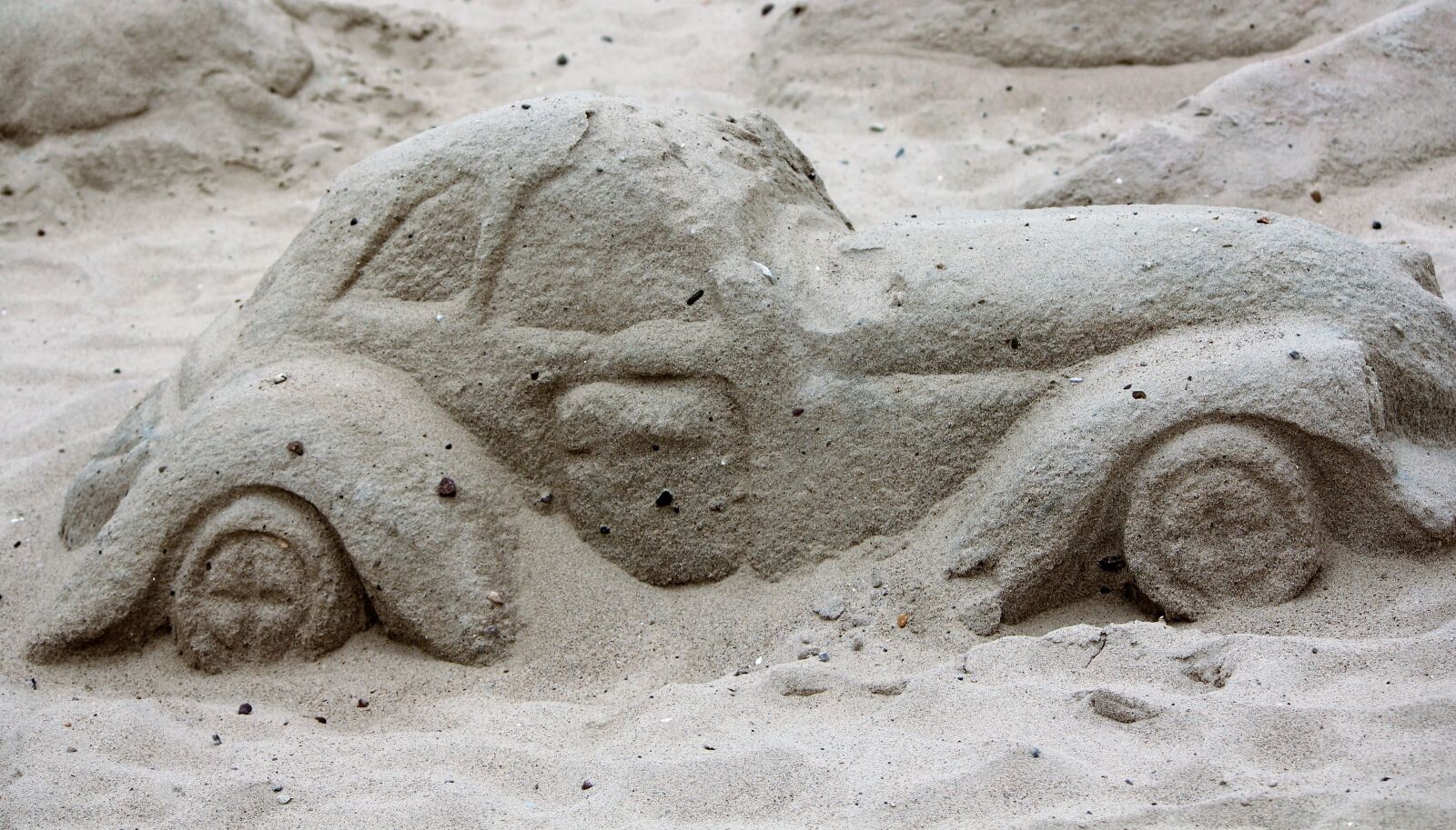 Canon EOS 550D (EOS Rebel T2i / EOS Kiss X4) sample photo. Sand, motif, water construction photography