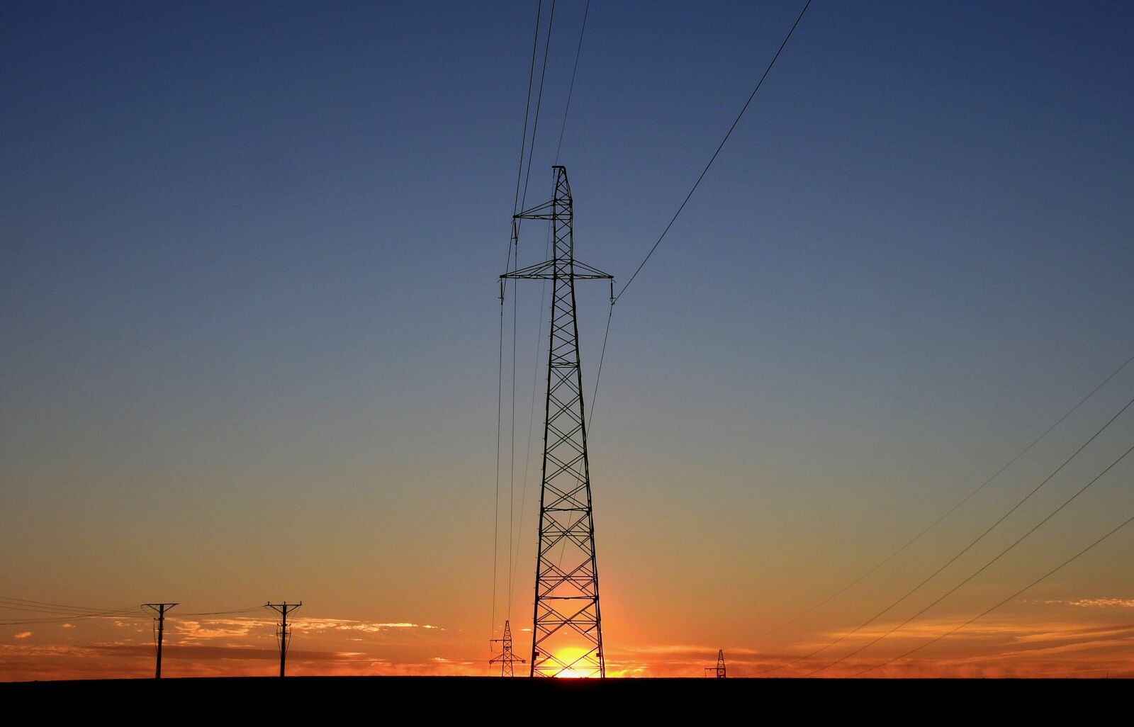 Nikon Coolpix P900 sample photo. Sunset, power poles, sky photography