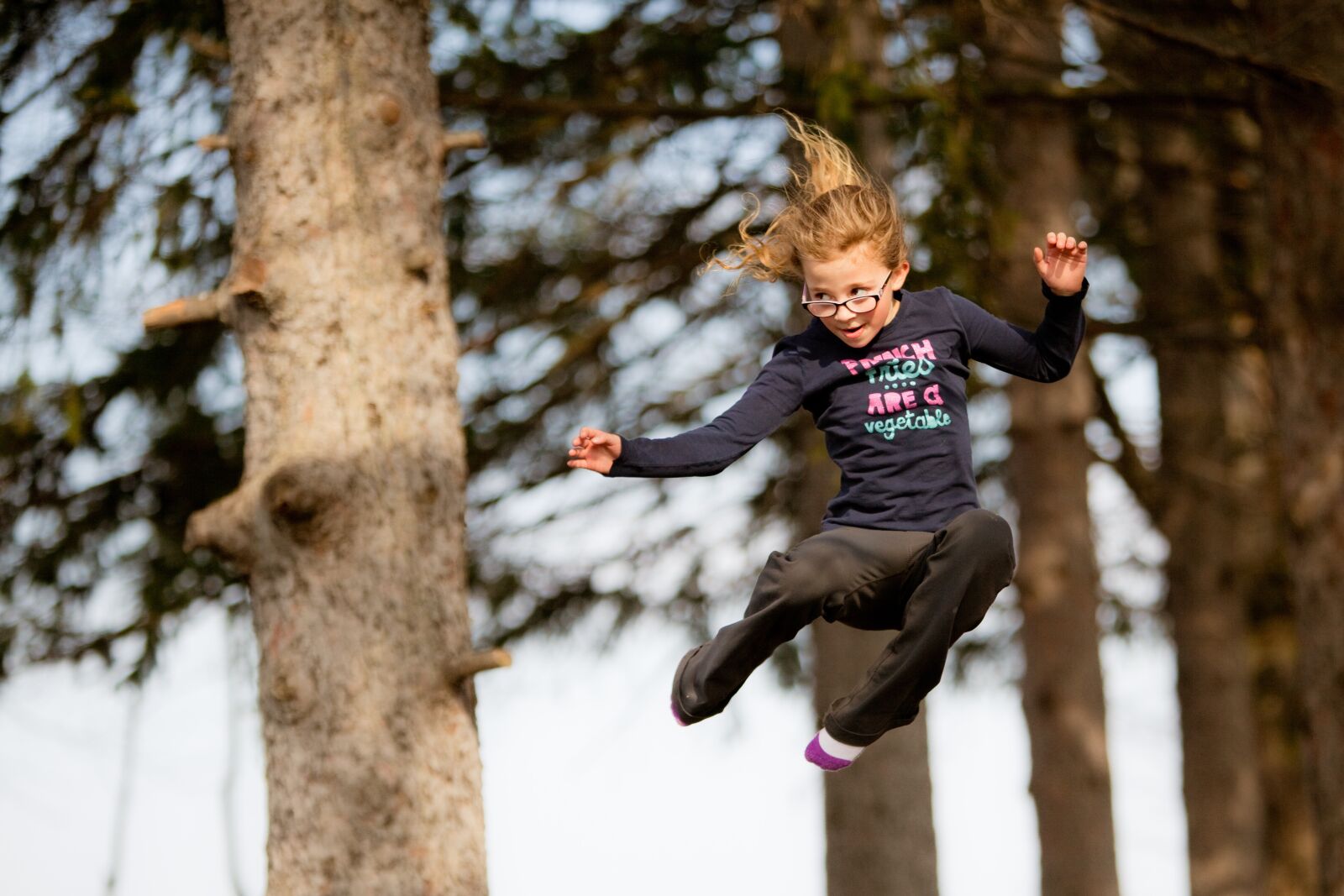 Canon EOS 5D Mark II sample photo. Jumping, young girl, trampoline photography