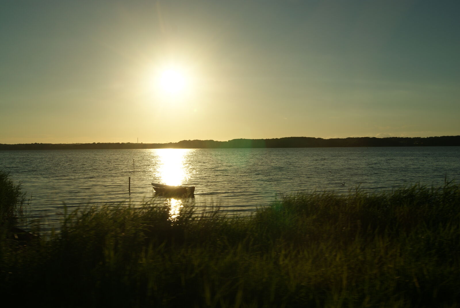 Sony Alpha DSLR-A230 sample photo. Boat, denmark, lake, sun photography