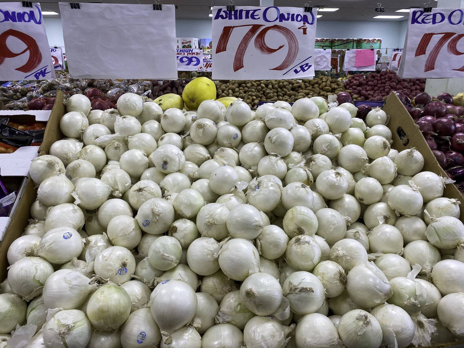 Apple iPhone 11 Pro sample photo. Onions, store, grocery photography