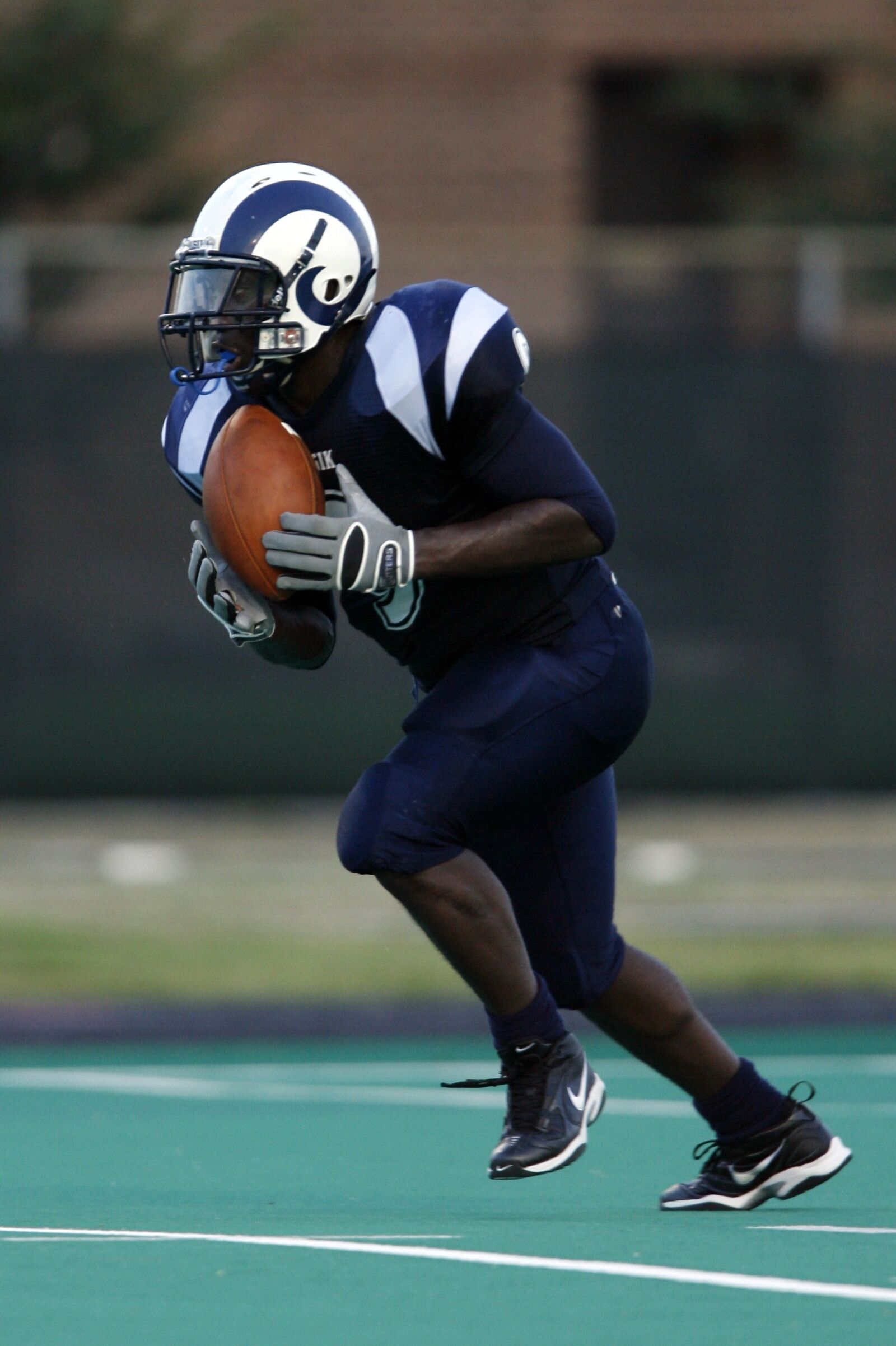 Canon EOS-1D Mark II N sample photo. American football, punt return photography