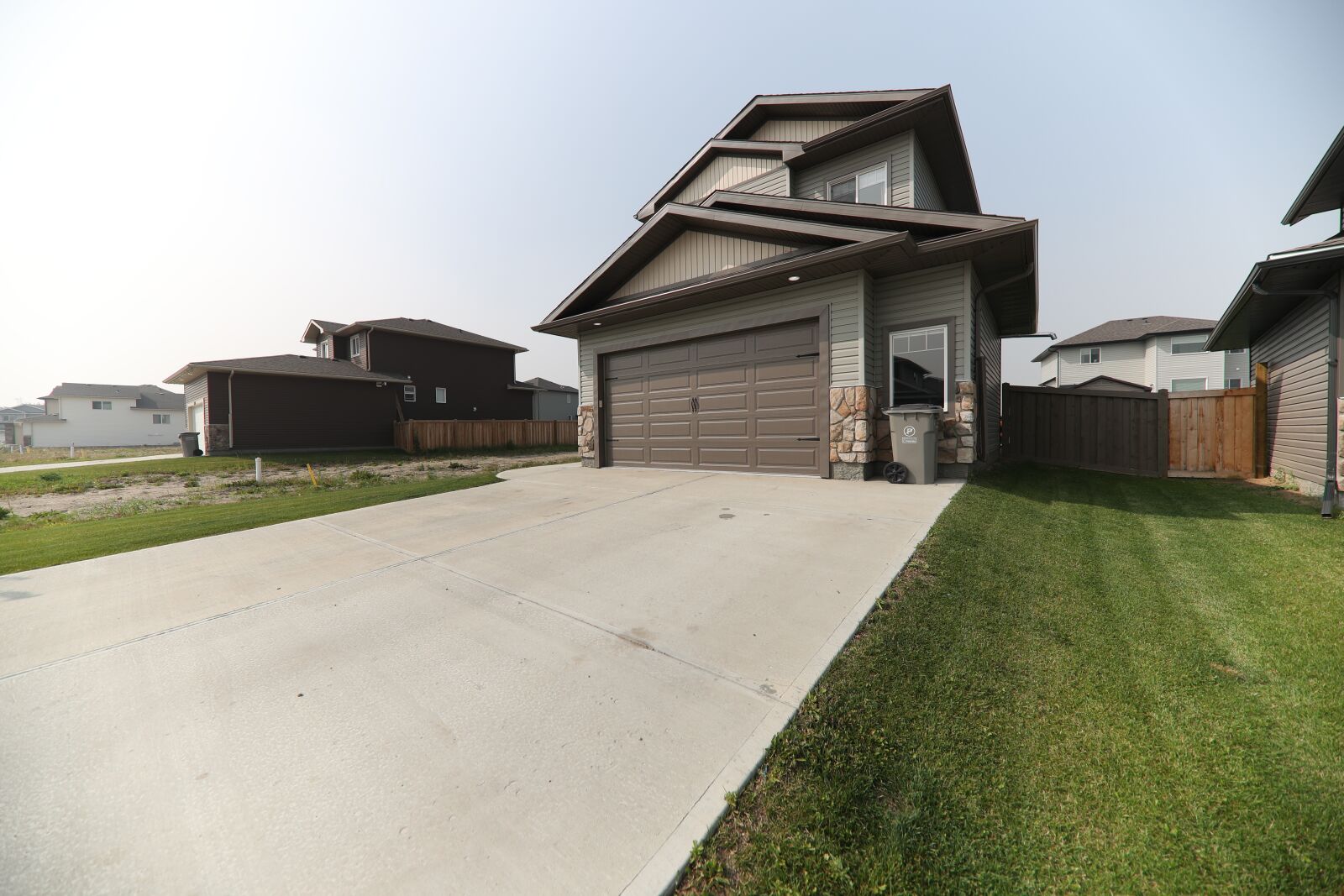 12-24mm F4 DG HSM | Art 016 sample photo. Driveway, outdoors, sunny photography