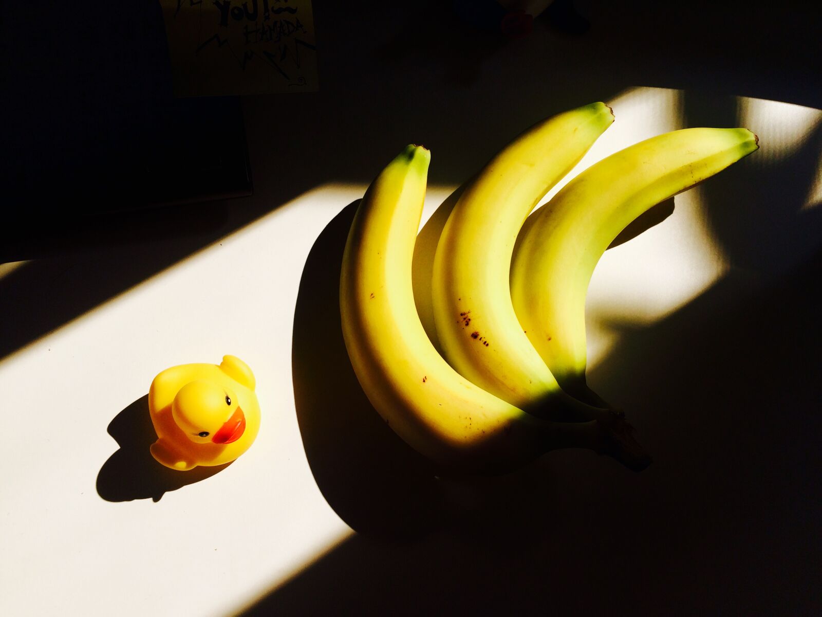 Apple iPhone 5s sample photo. Banana, contrast, dark, desk photography